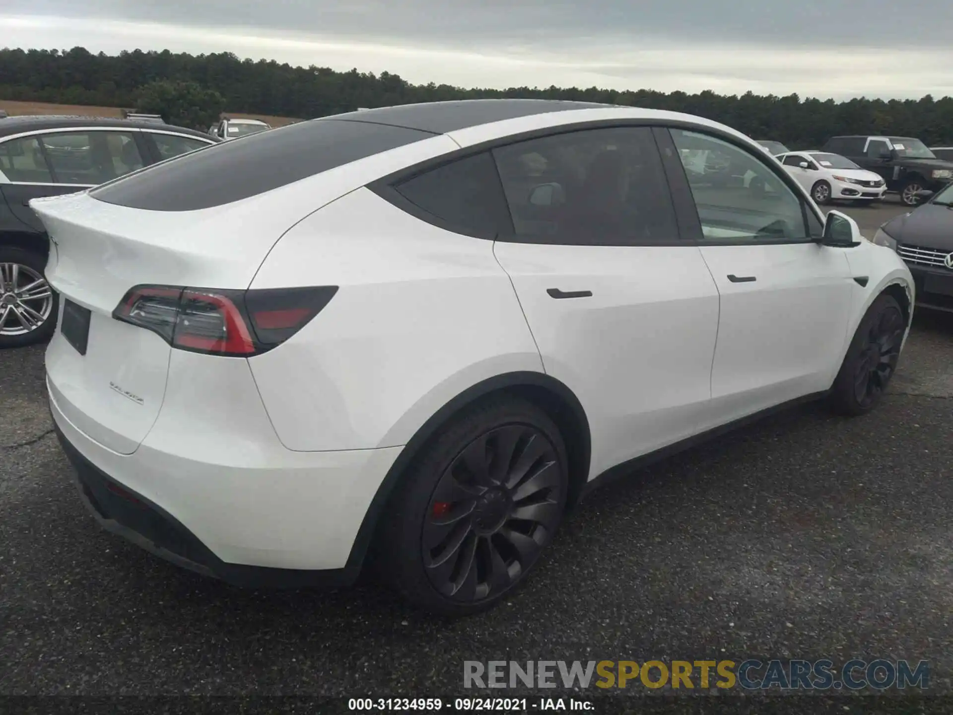 4 Photograph of a damaged car 5YJYGDEFXMF090087 TESLA MODEL Y 2021