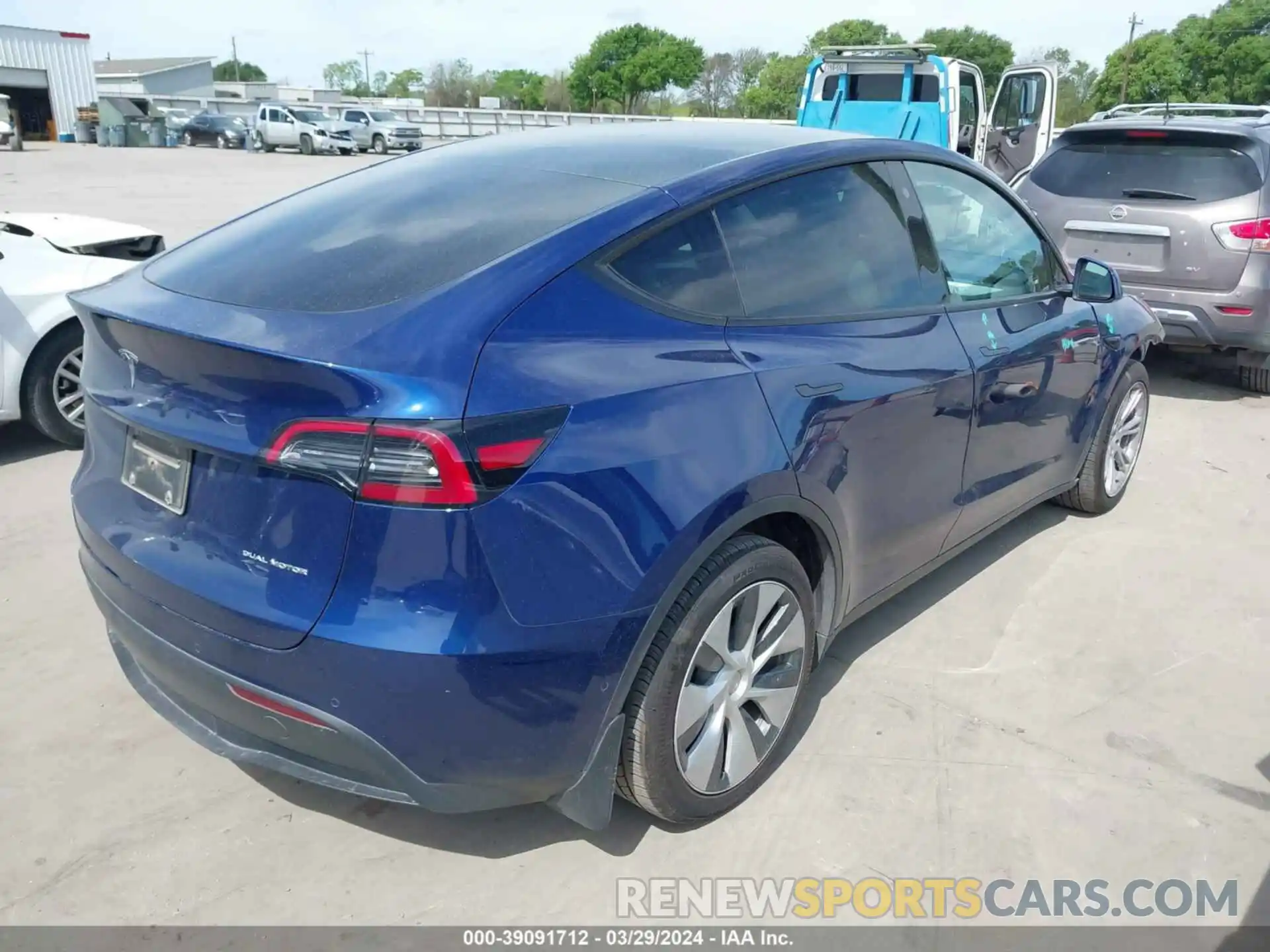 4 Photograph of a damaged car 7SAYGAEE0NF570780 TESLA MODEL Y 2022