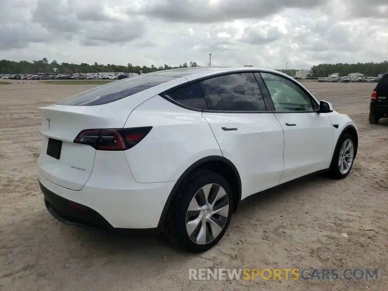 4 Photograph of a damaged car 7SAYGDEE1NF315105 TESLA MODEL Y 2022