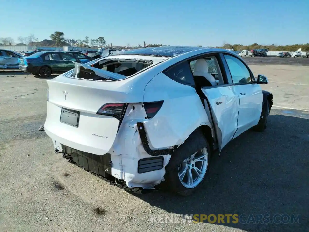 4 Photograph of a damaged car 7SAYGDEE1NF327531 TESLA MODEL Y 2022