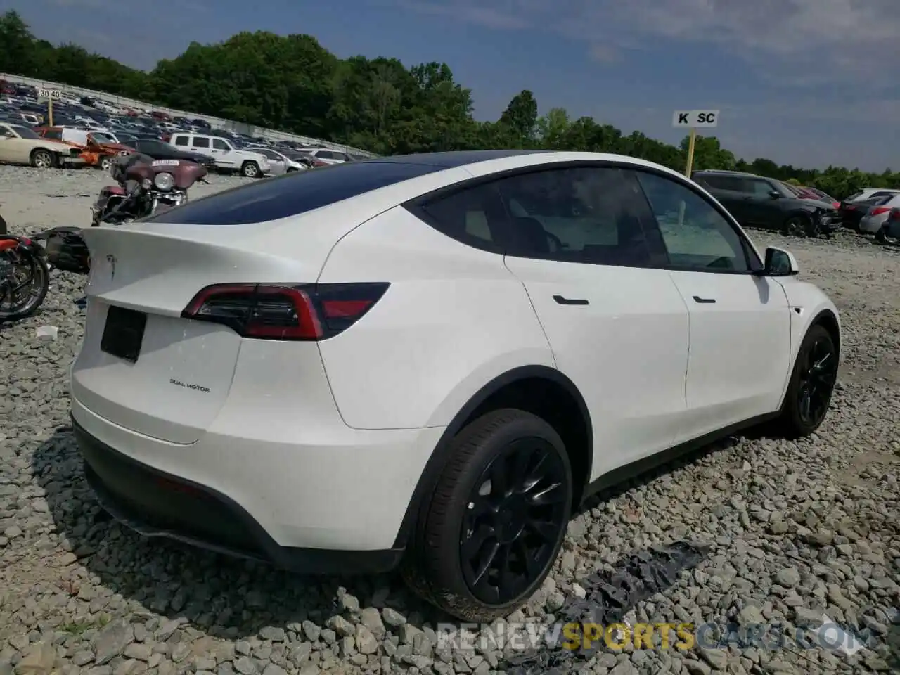 4 Photograph of a damaged car 7SAYGDEE2NF387463 TESLA MODEL Y 2022