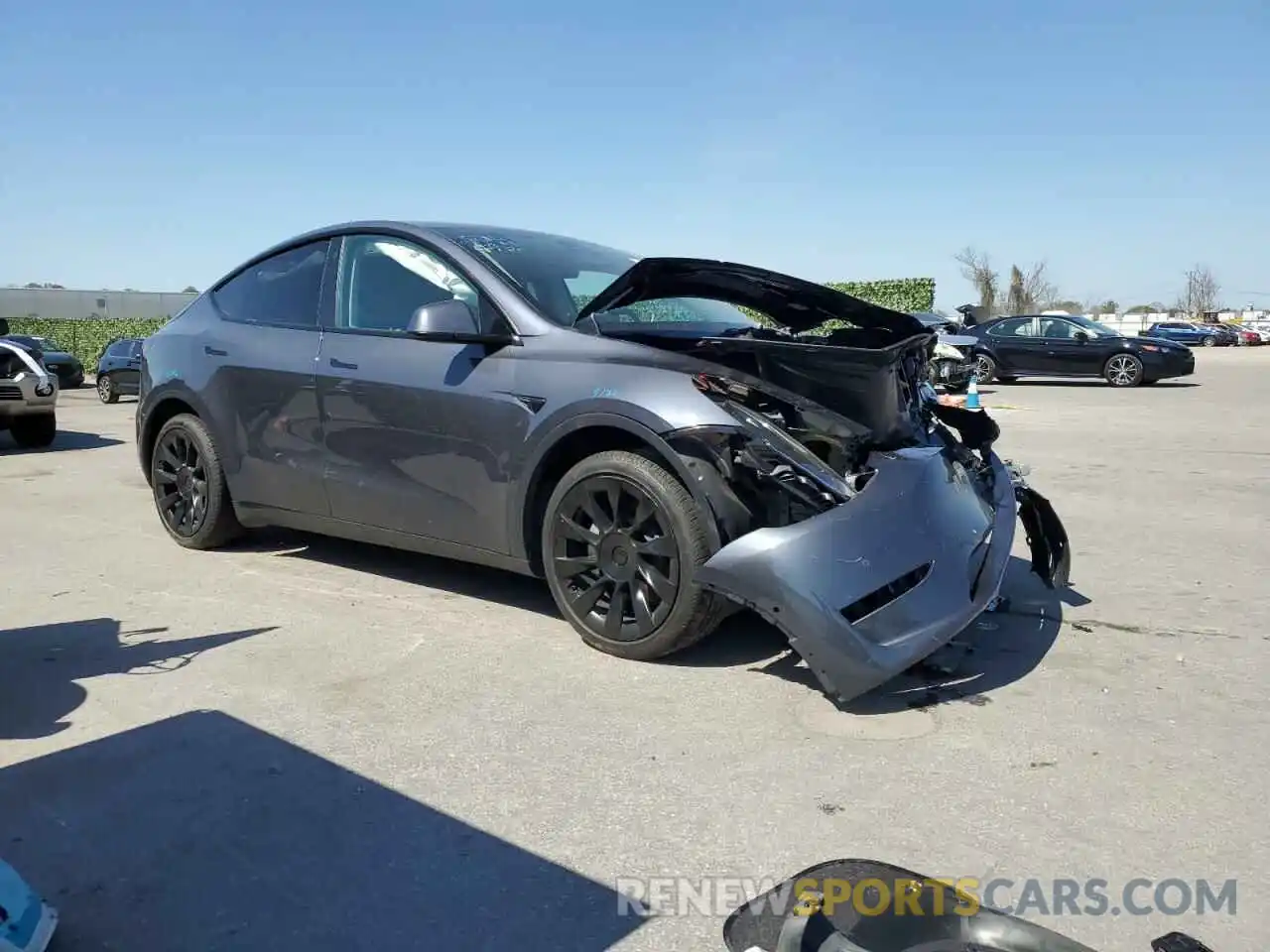 4 Photograph of a damaged car 7SAYGDEE3NF311282 TESLA MODEL Y 2022