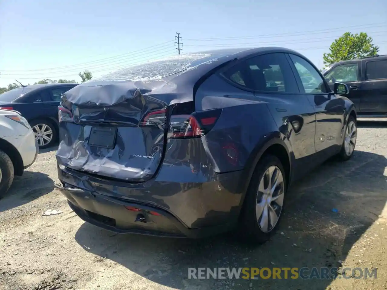 4 Photograph of a damaged car 7SAYGDEEXNF313840 TESLA MODEL Y 2022