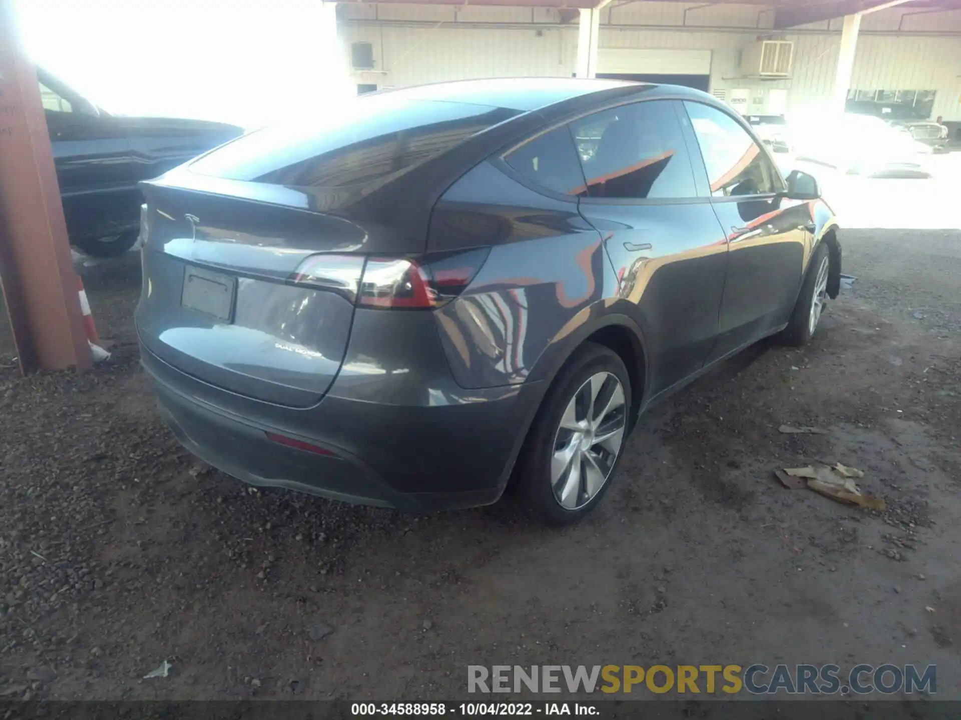 4 Photograph of a damaged car 7SAYGDEEXNF360690 TESLA MODEL Y 2022