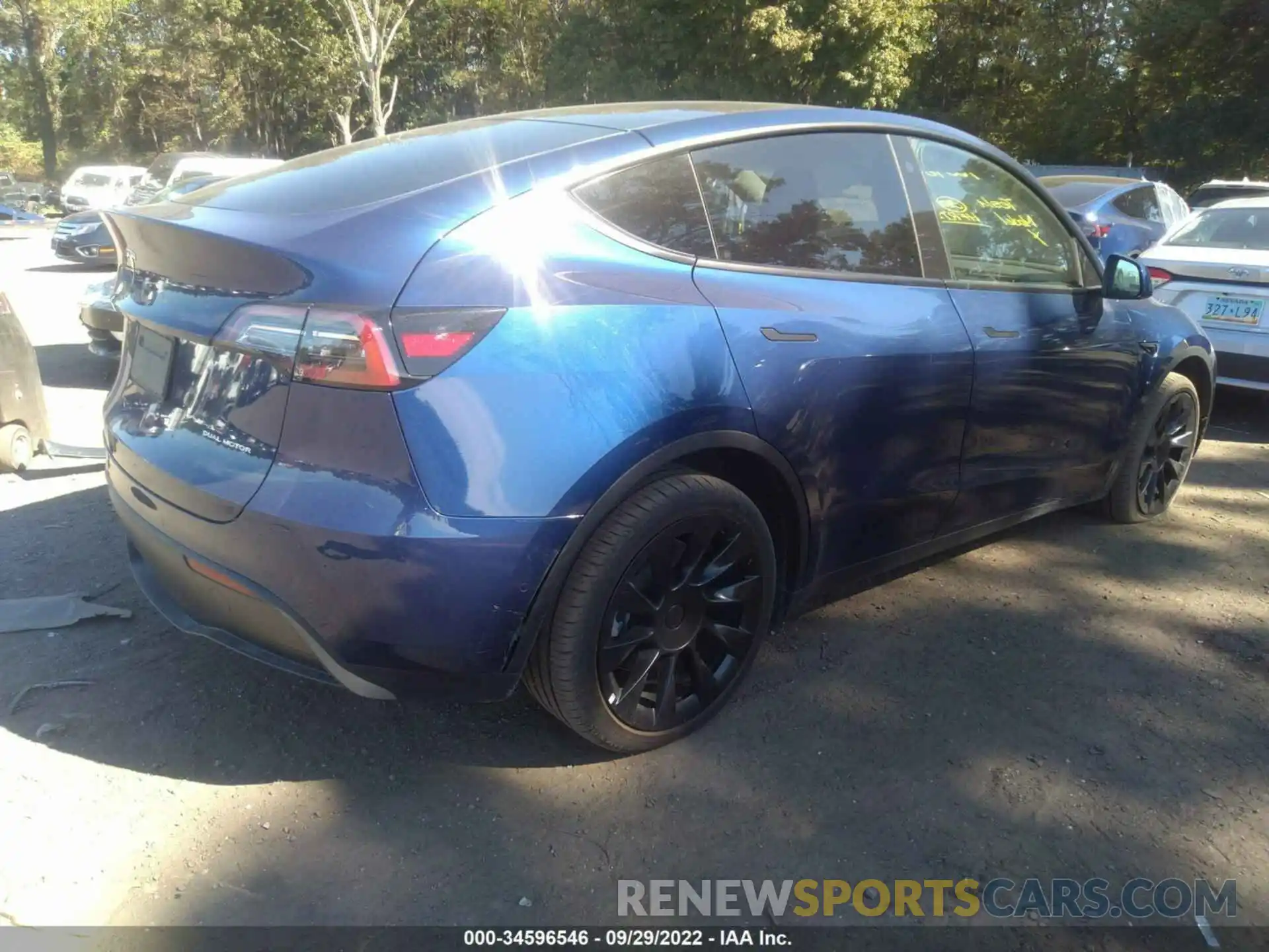 4 Photograph of a damaged car 7SAYGDEEXNF386741 TESLA MODEL Y 2022