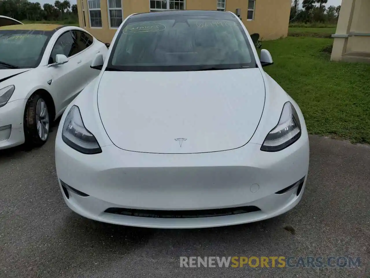 7 Photograph of a damaged car 7SAYGDEEXNF437669 TESLA MODEL Y 2022