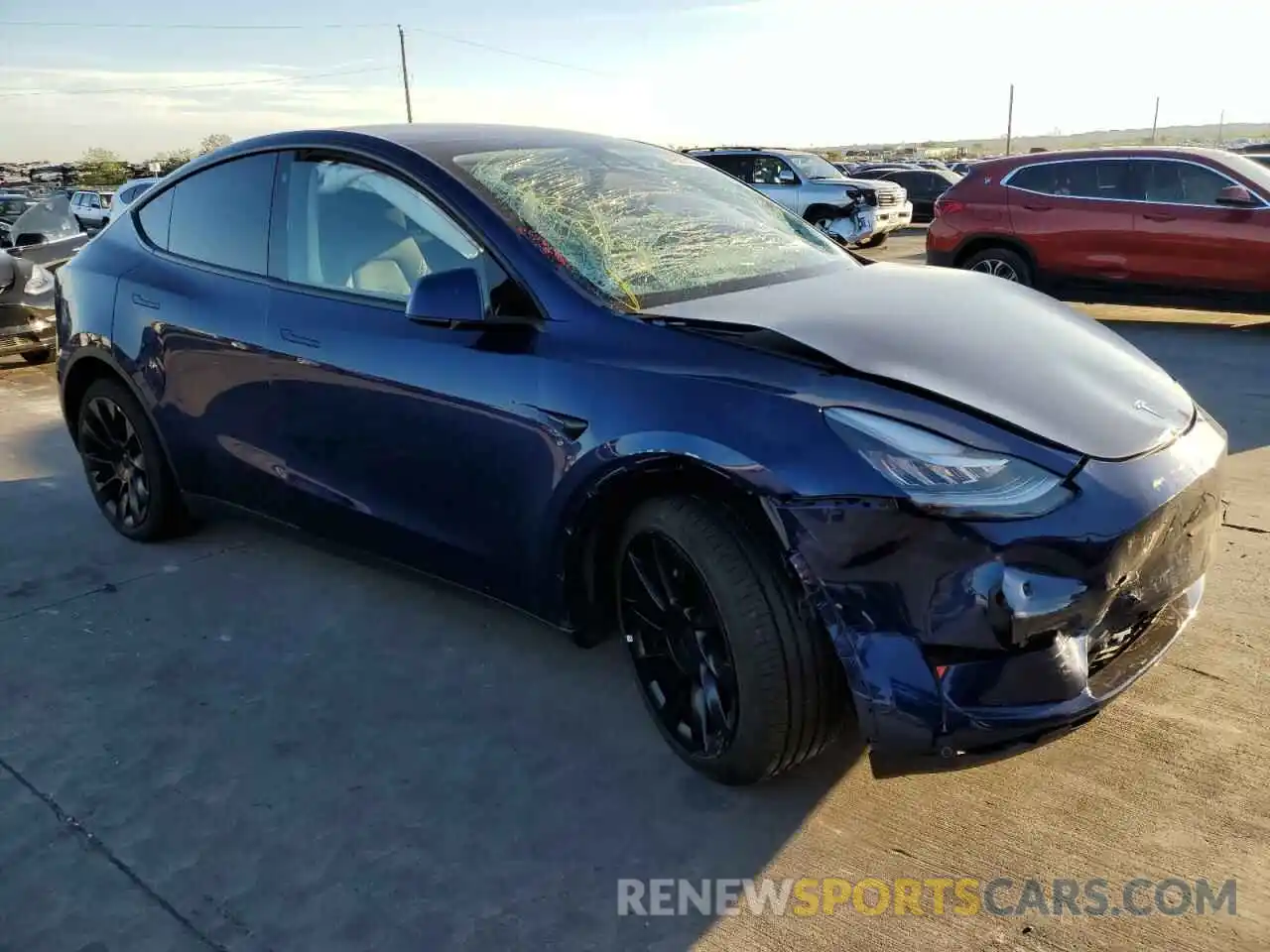 4 Photograph of a damaged car 7SAYGDEEXNF480084 TESLA MODEL Y 2022