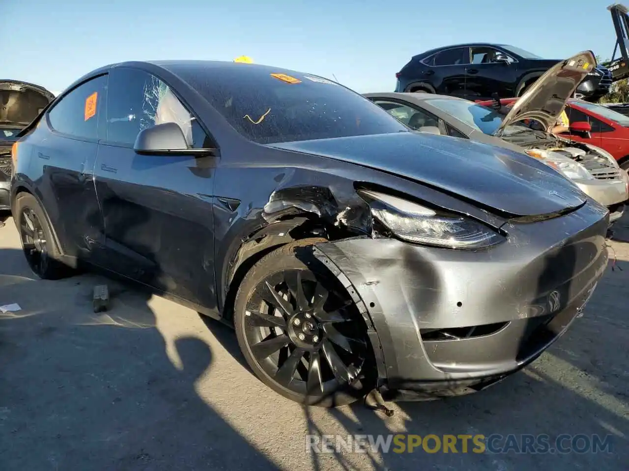 4 Photograph of a damaged car 7SAYGDEEXNF481767 TESLA MODEL Y 2022