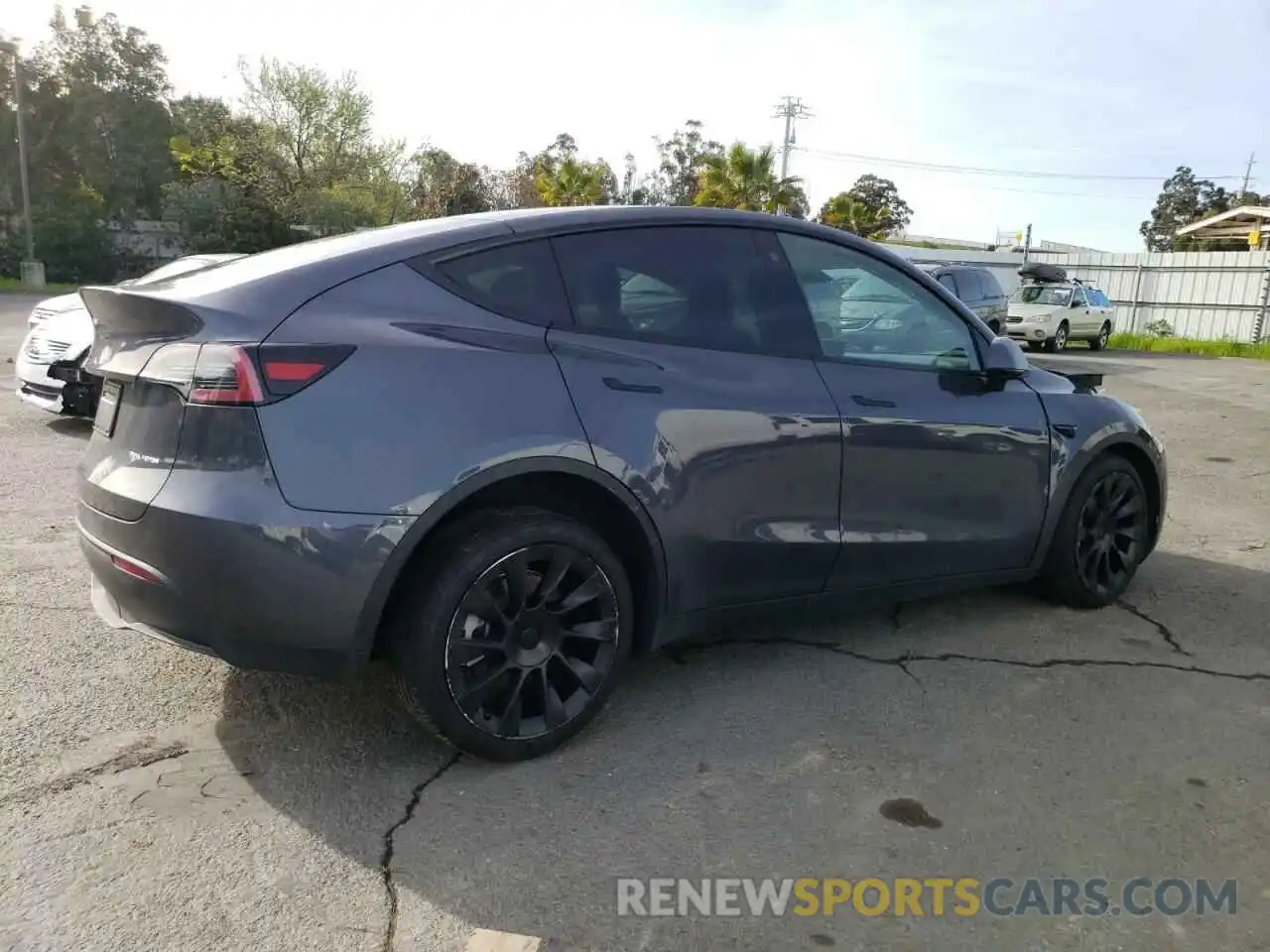 3 Photograph of a damaged car 7SAYGDEEXNF491506 TESLA MODEL Y 2022