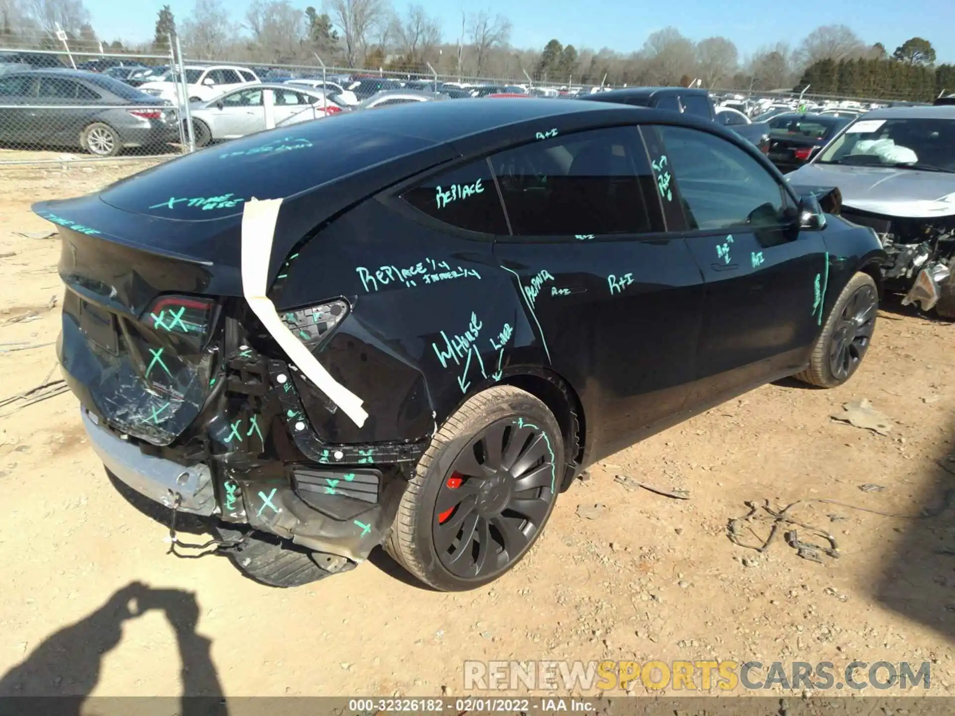 4 Photograph of a damaged car 7SAYGDEF0NF320322 TESLA MODEL Y 2022