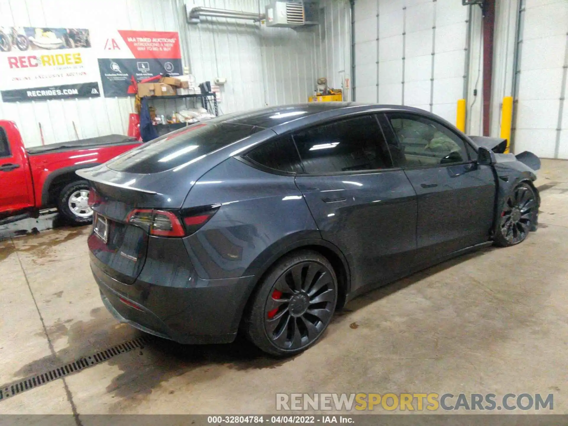 4 Photograph of a damaged car 7SAYGDEF3NF370356 TESLA MODEL Y 2022