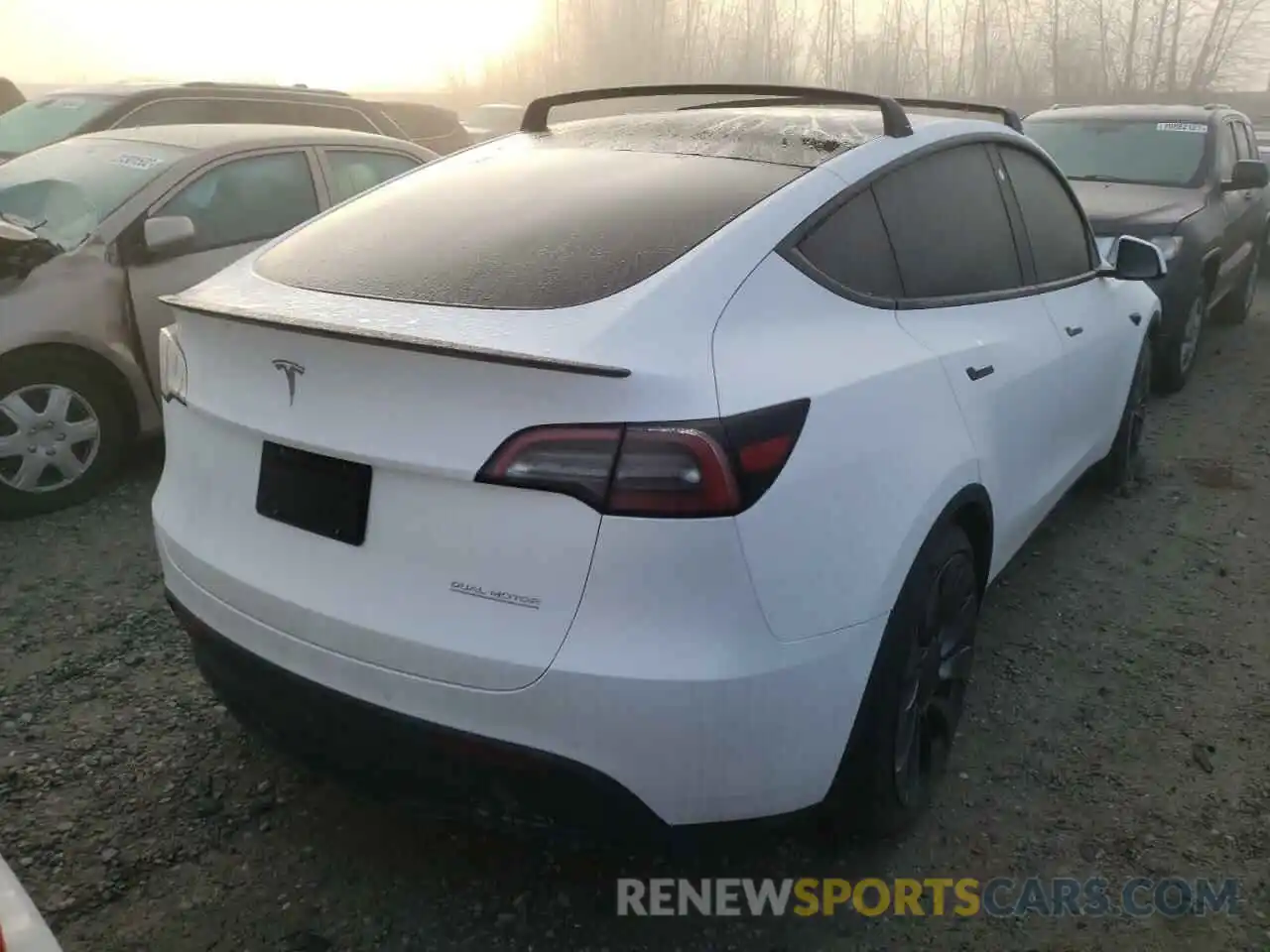 4 Photograph of a damaged car 7SAYGDEF4NF324342 TESLA MODEL Y 2022