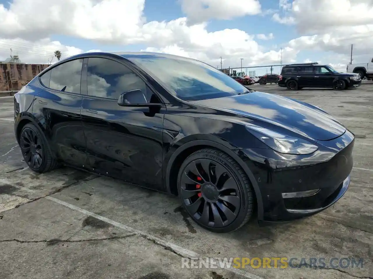 4 Photograph of a damaged car 7SAYGDEF5NF326679 TESLA MODEL Y 2022