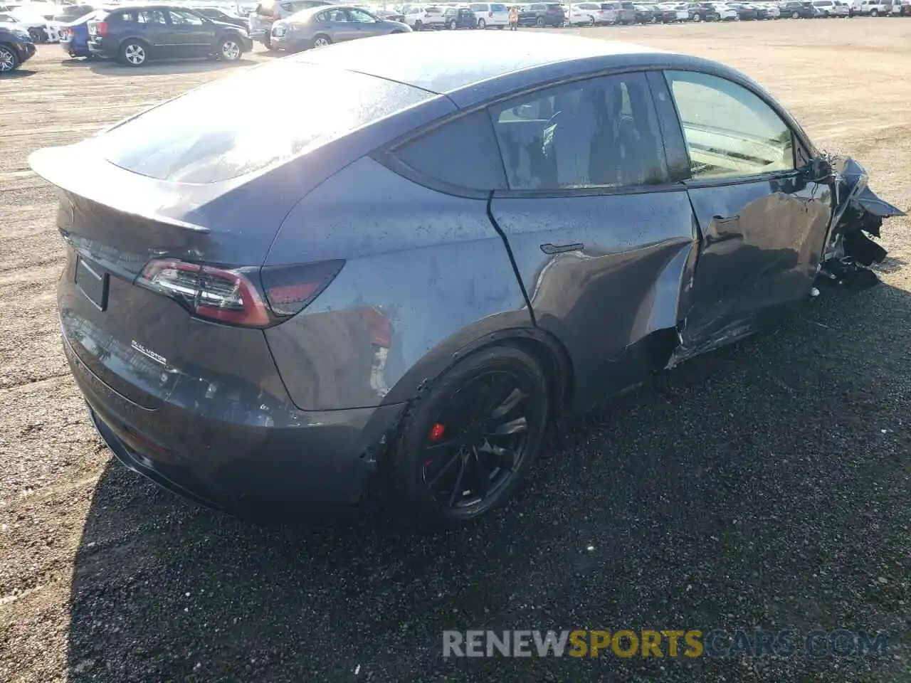 4 Photograph of a damaged car 7SAYGDEF6NF326772 TESLA MODEL Y 2022