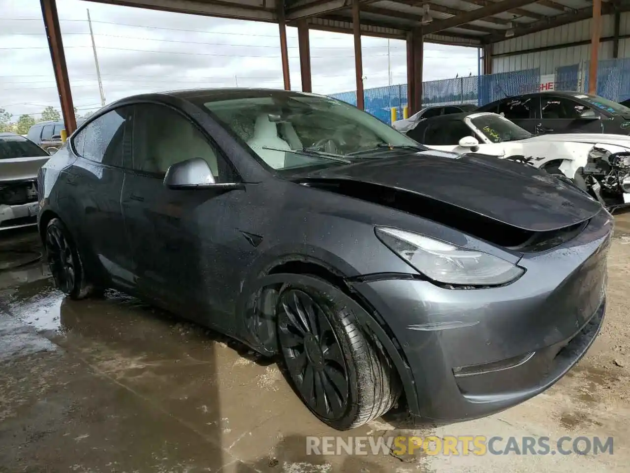 4 Photograph of a damaged car 7SAYGDEF6NF469009 TESLA MODEL Y 2022