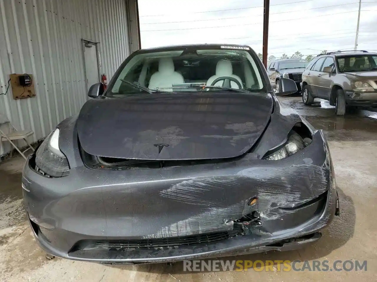 5 Photograph of a damaged car 7SAYGDEF6NF469009 TESLA MODEL Y 2022