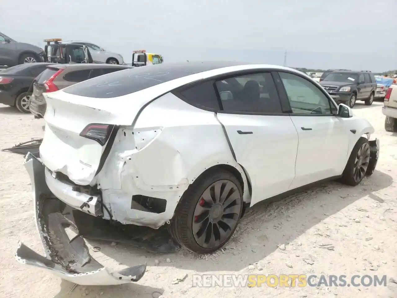 4 Photograph of a damaged car 7SAYGDEF8NF323355 TESLA MODEL Y 2022