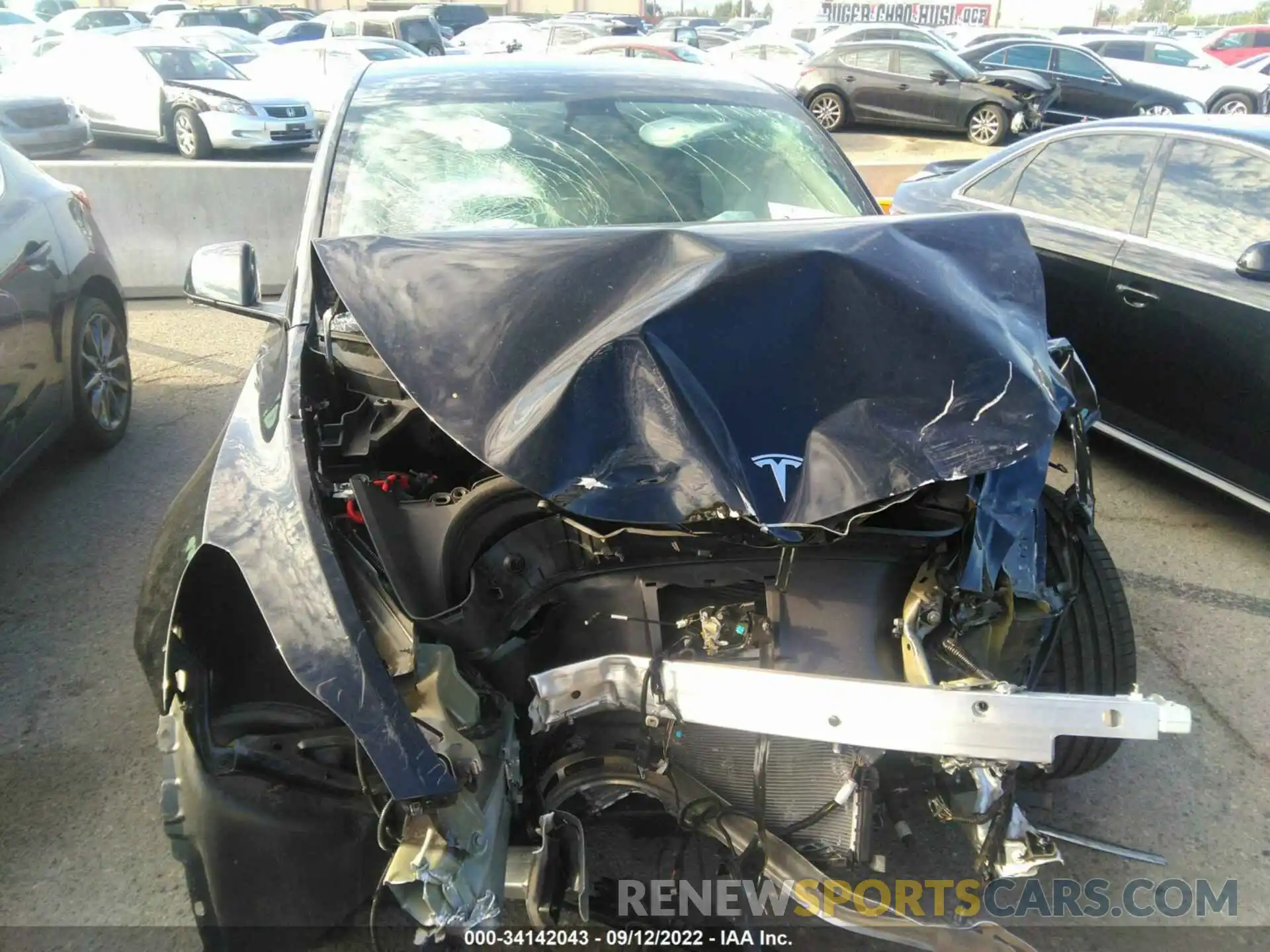 6 Photograph of a damaged car 7SAYGDEF9NF324000 TESLA MODEL Y 2022