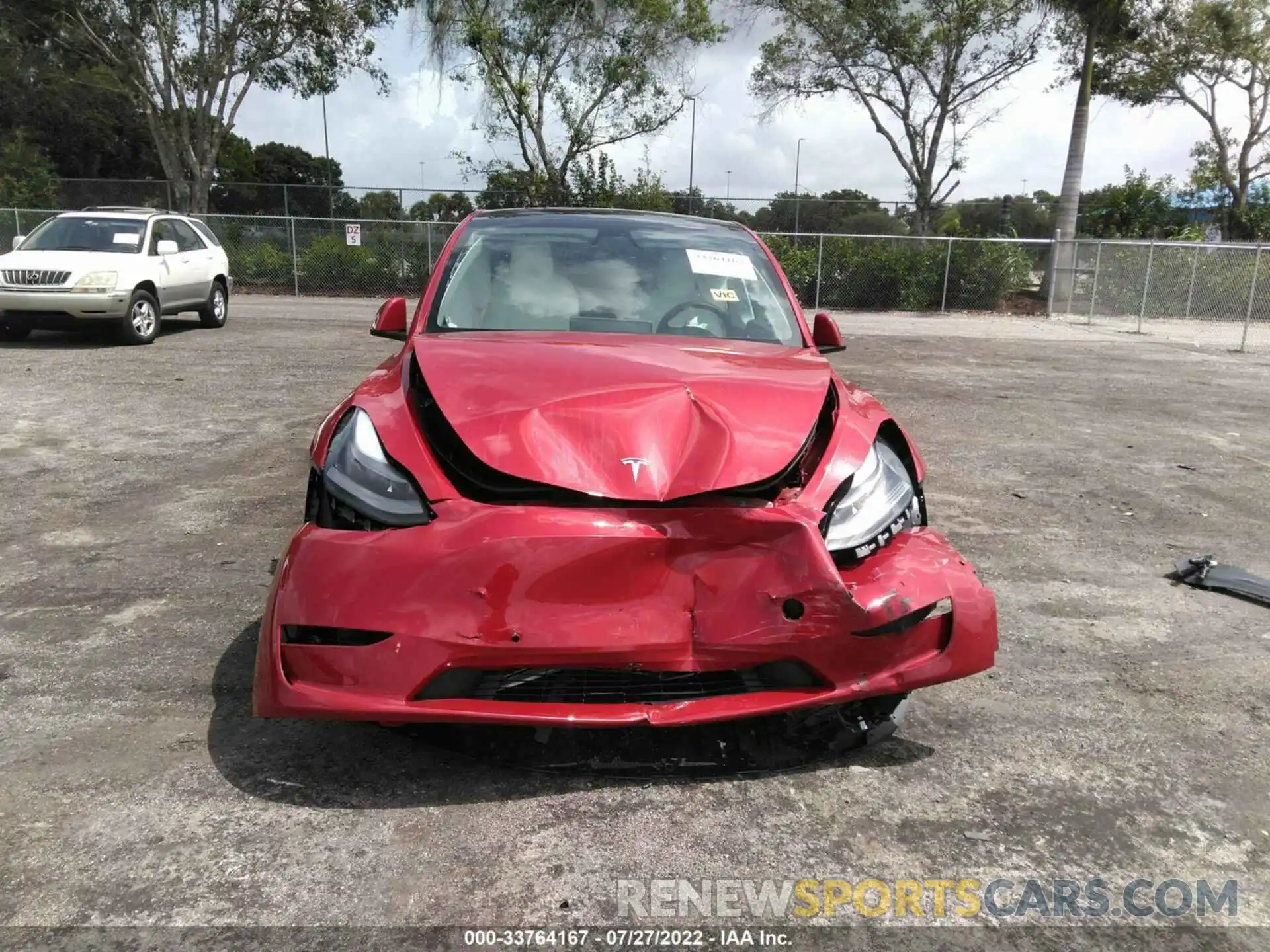 6 Photograph of a damaged car 7SAYGDEFXNF327343 TESLA MODEL Y 2022