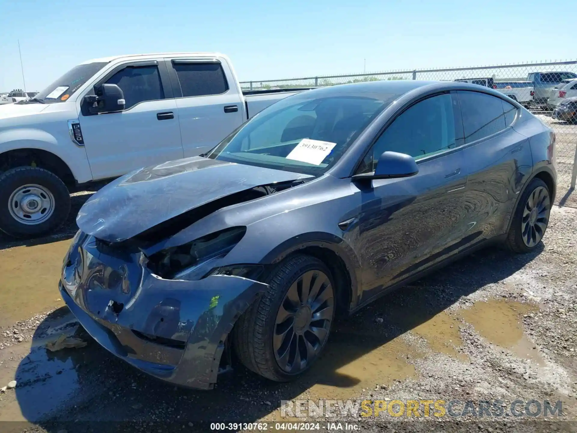 2 Photograph of a damaged car 7SAYGDEFXNF521189 TESLA MODEL Y 2022