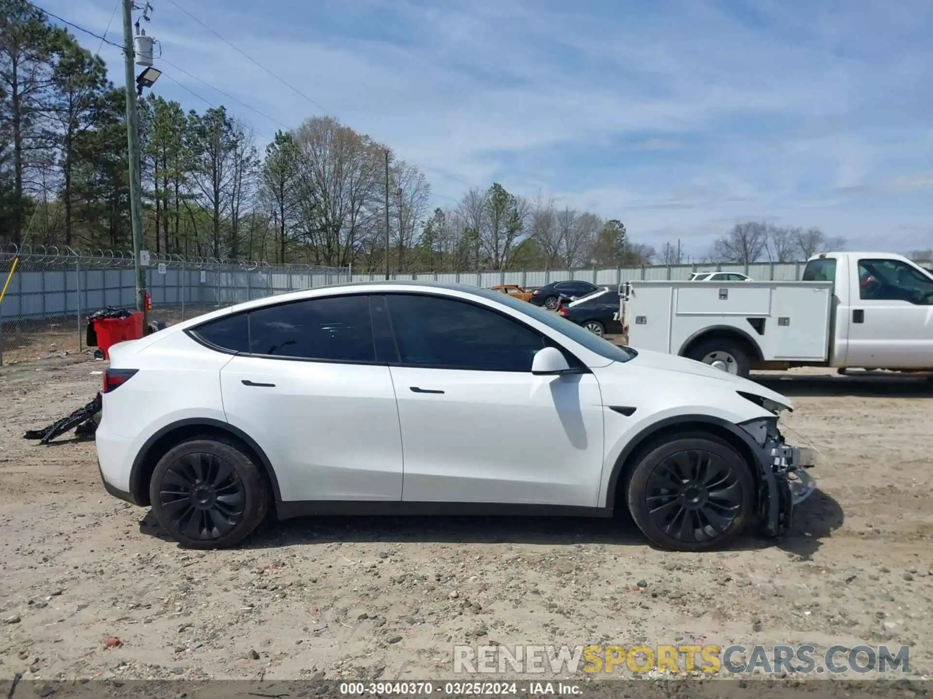 14 Photograph of a damaged car 7SAYGAEE2PF660094 TESLA MODEL Y 2023