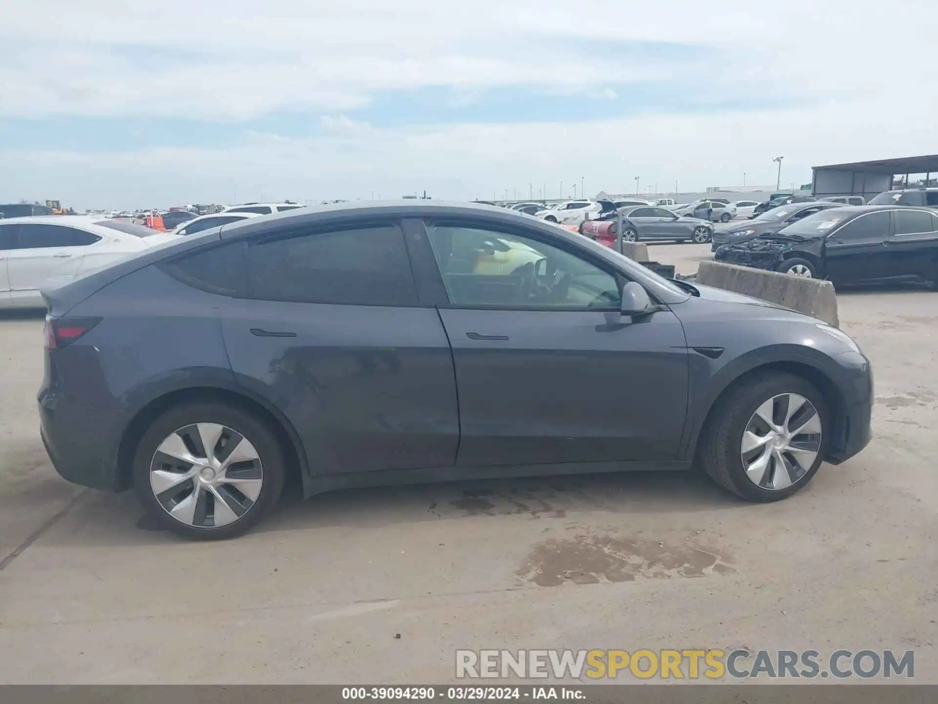 12 Photograph of a damaged car 7SAYGAEE7PF768825 TESLA MODEL Y 2023