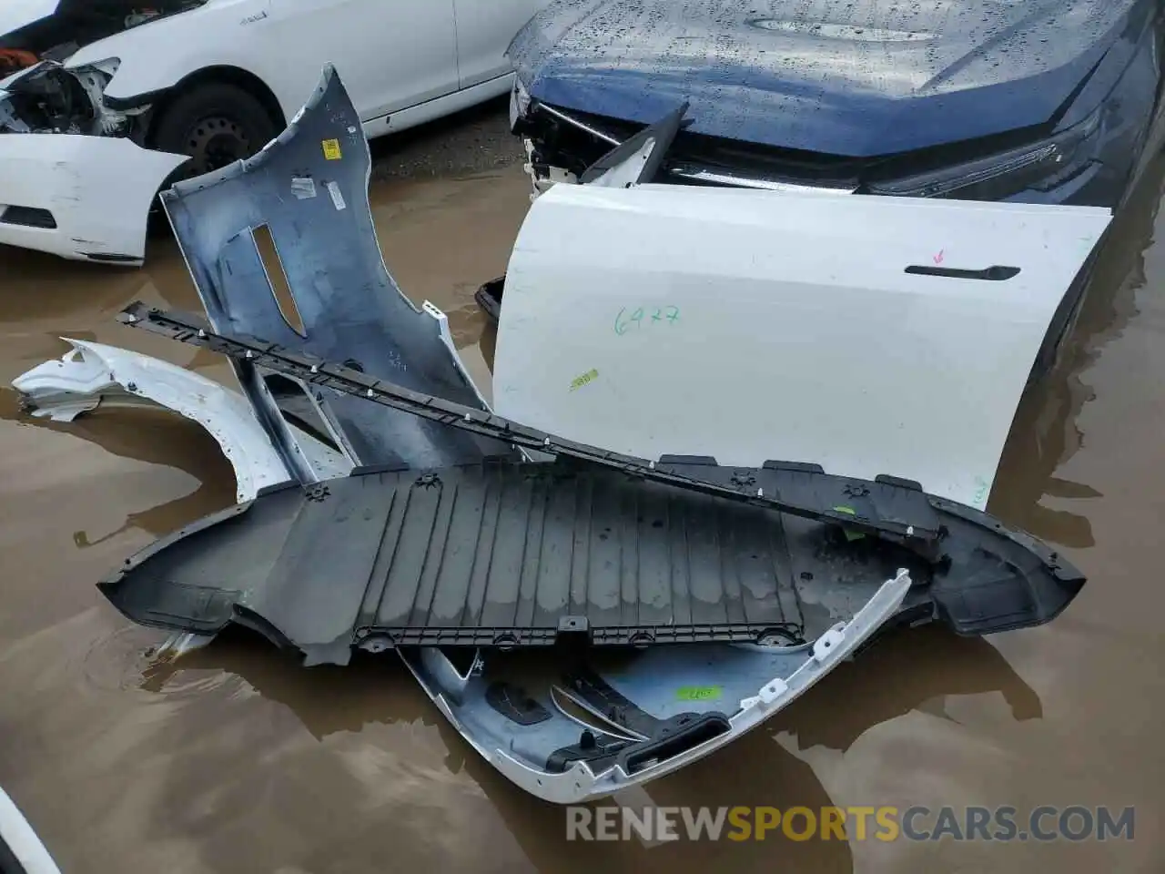 12 Photograph of a damaged car 7SAYGDEE1PF631378 TESLA MODEL Y 2023