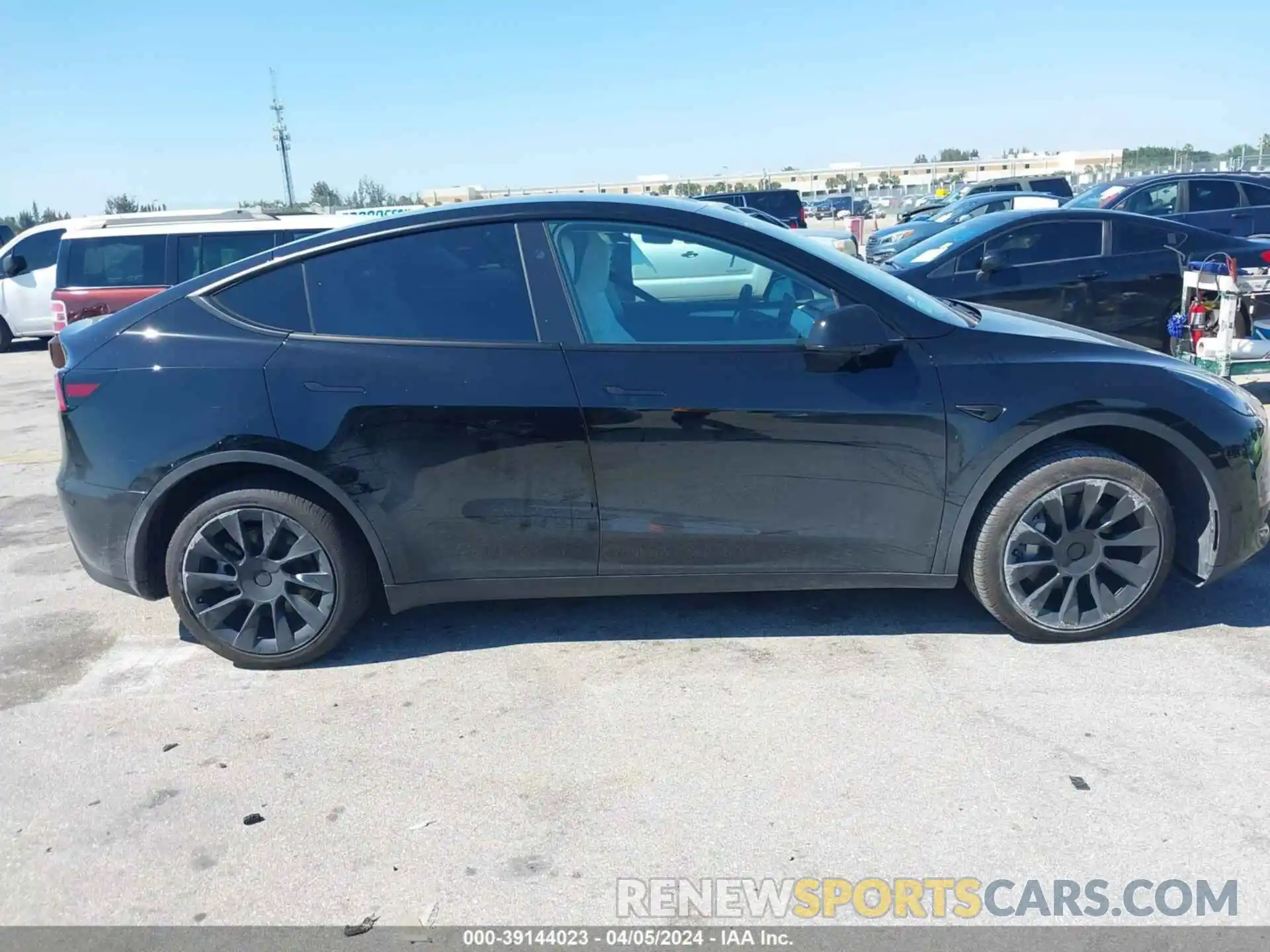 12 Photograph of a damaged car 7SAYGDEE1PF937030 TESLA MODEL Y 2023