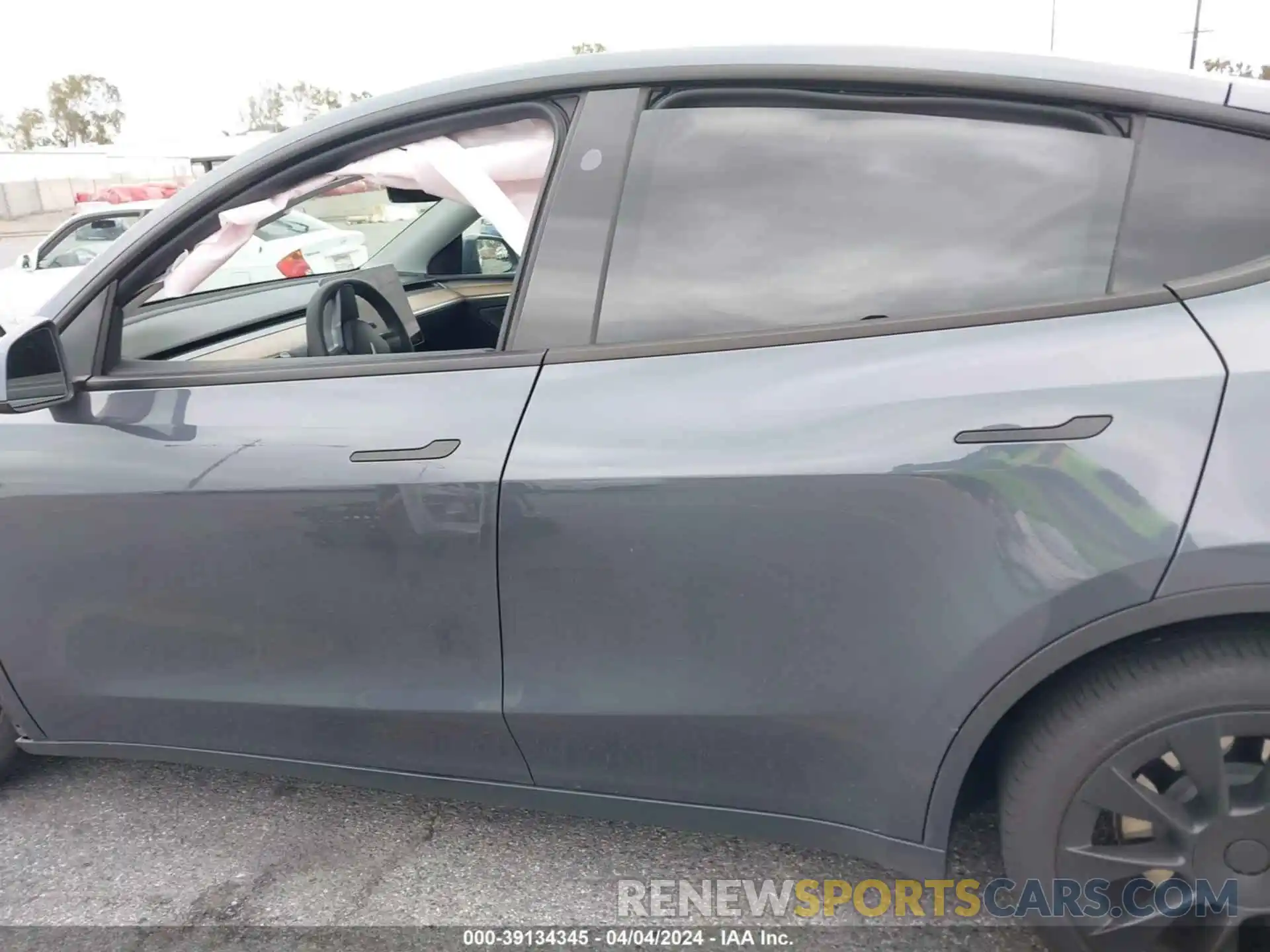 13 Photograph of a damaged car 7SAYGDEE9PF938426 TESLA MODEL Y 2023