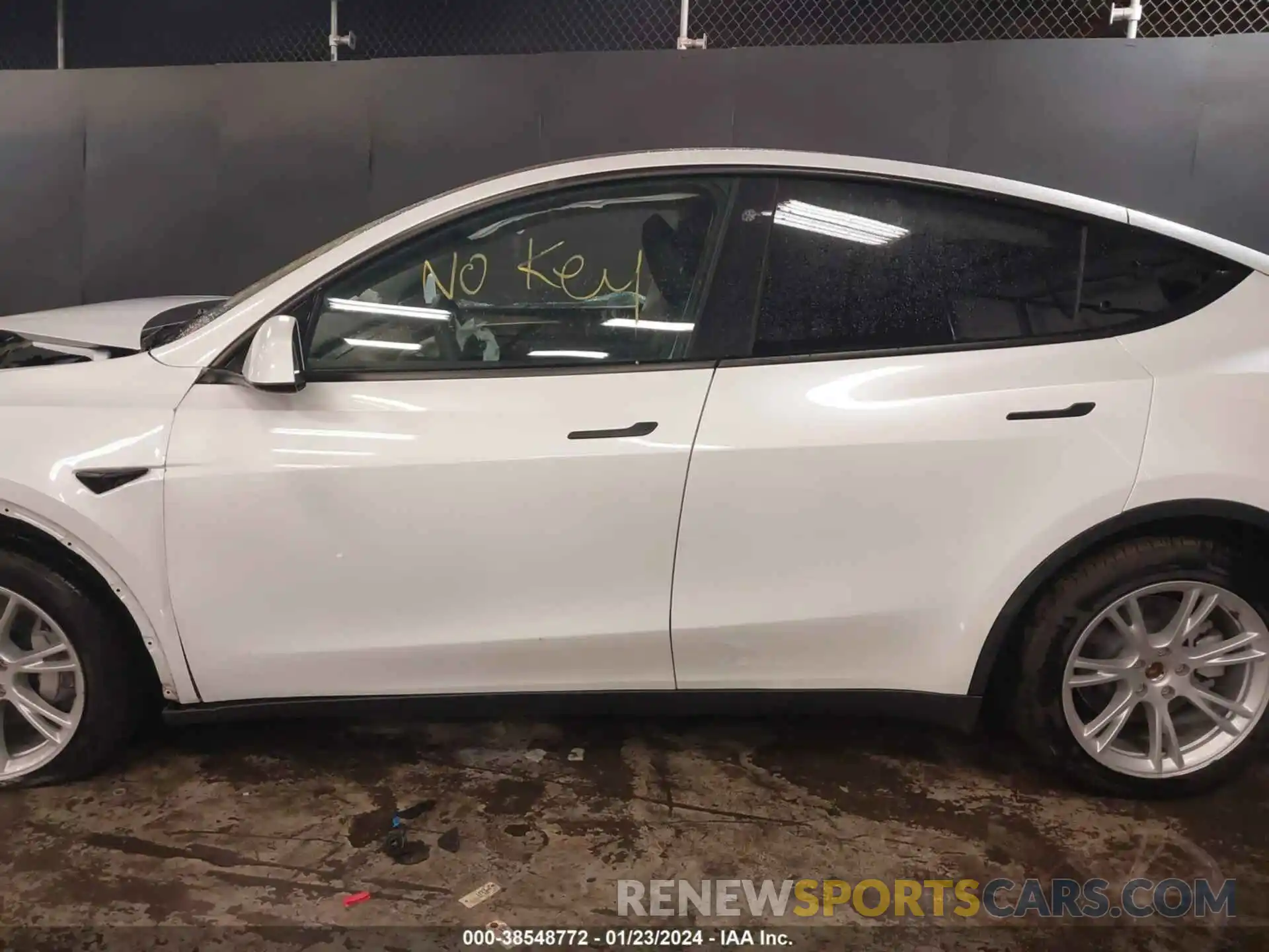 14 Photograph of a damaged car 7SAYGDEEXPA101374 TESLA MODEL Y 2023