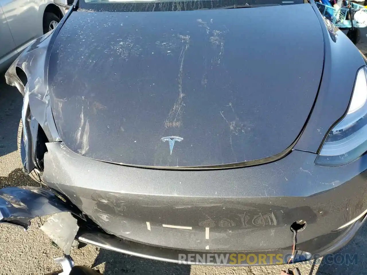 11 Photograph of a damaged car 7SAYGDEEXPA117977 TESLA MODEL Y 2023