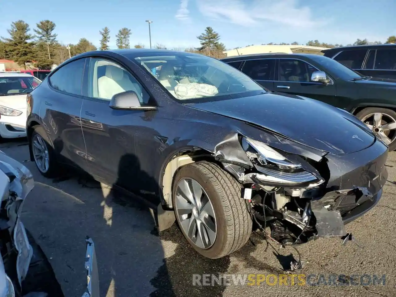 4 Photograph of a damaged car 7SAYGDEEXPA117977 TESLA MODEL Y 2023