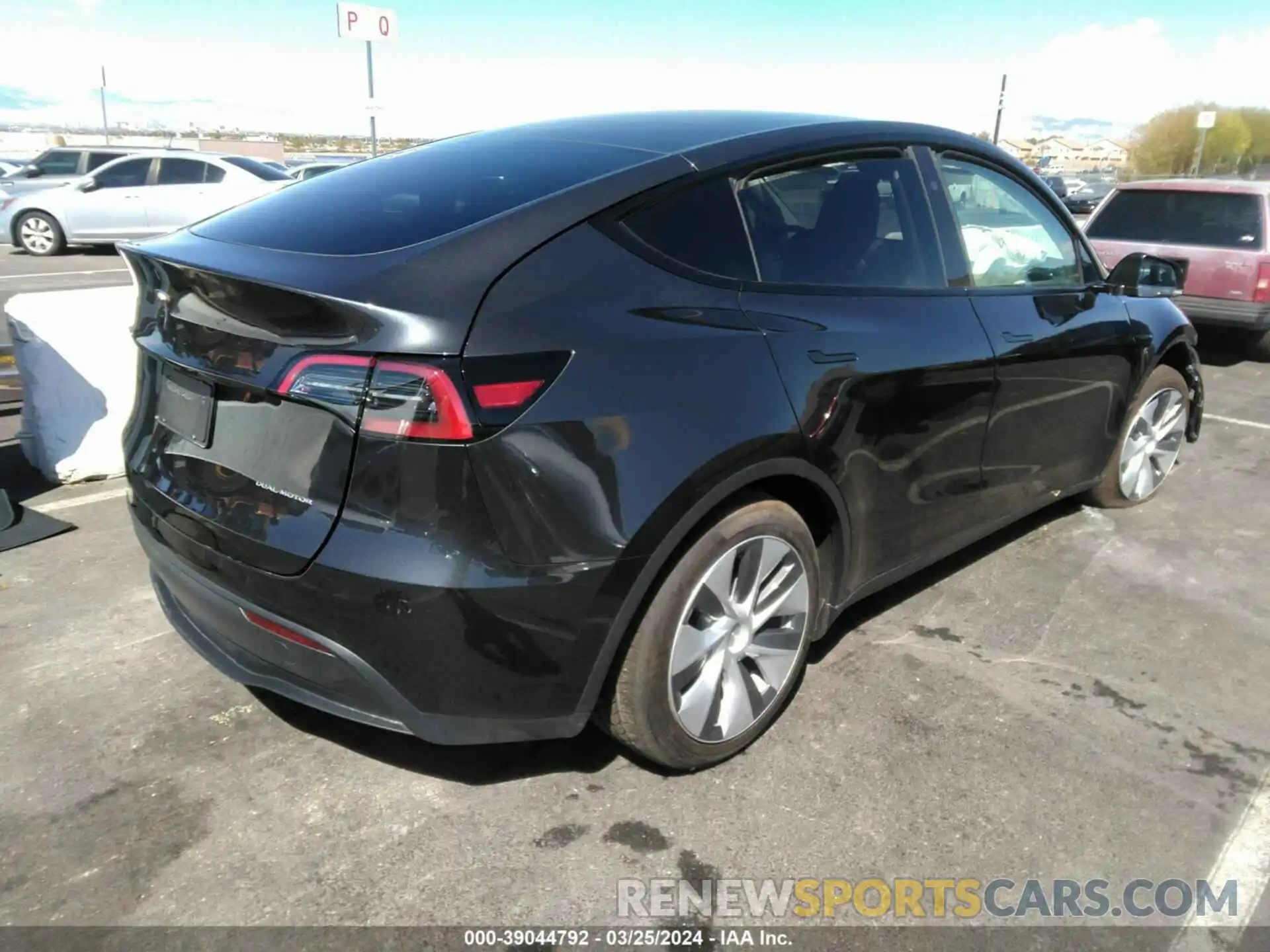 4 Photograph of a damaged car 7SAYGAEE1RF987153 TESLA MODEL Y 2024