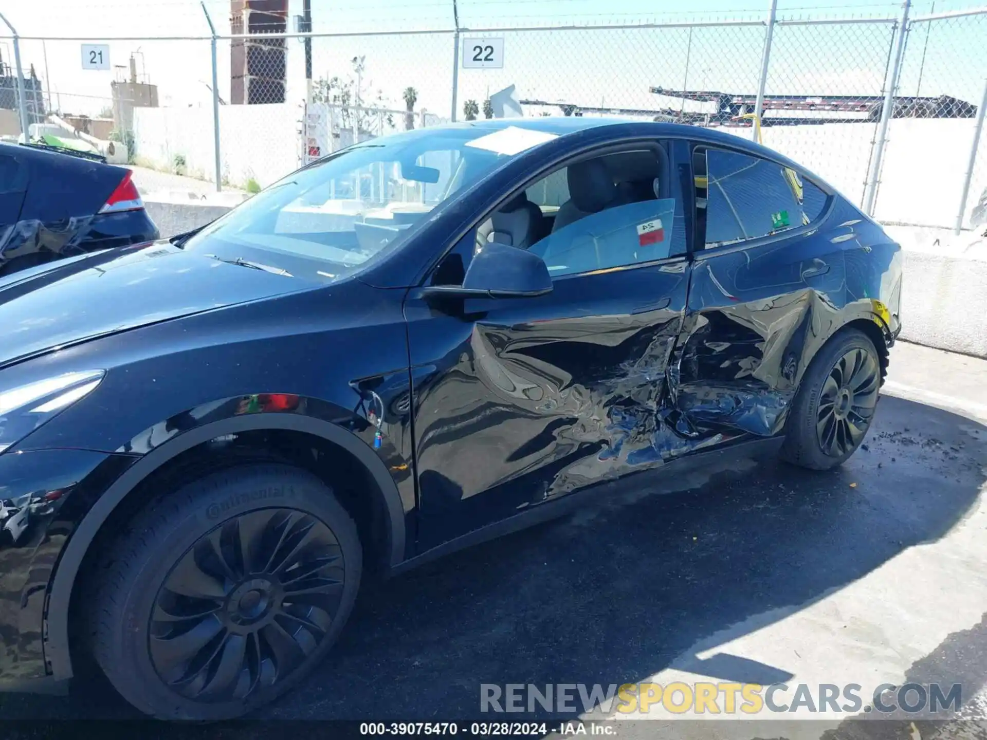 6 Photograph of a damaged car 7SAYGDED5RF010199 TESLA MODEL Y 2024