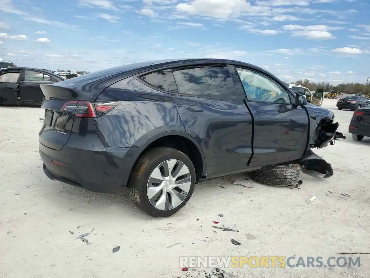 3 Photograph of a damaged car 7SAYGDEE3RF991352 TESLA MODEL Y 2024