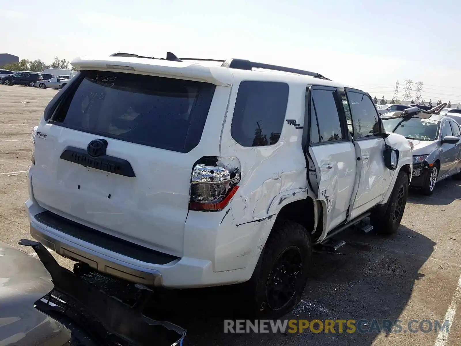 4 Photograph of a damaged car JTEBU5JR3K5689069 TOYOTA 4RUNNER 2019