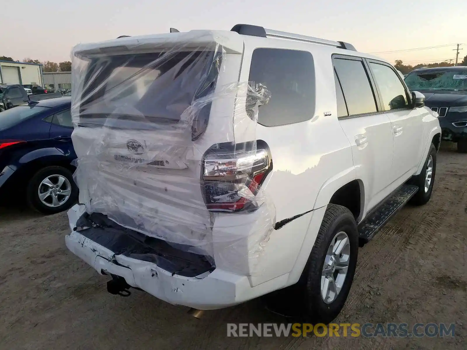 4 Photograph of a damaged car JTEBU5JR9K5645545 TOYOTA 4RUNNER SR 2019