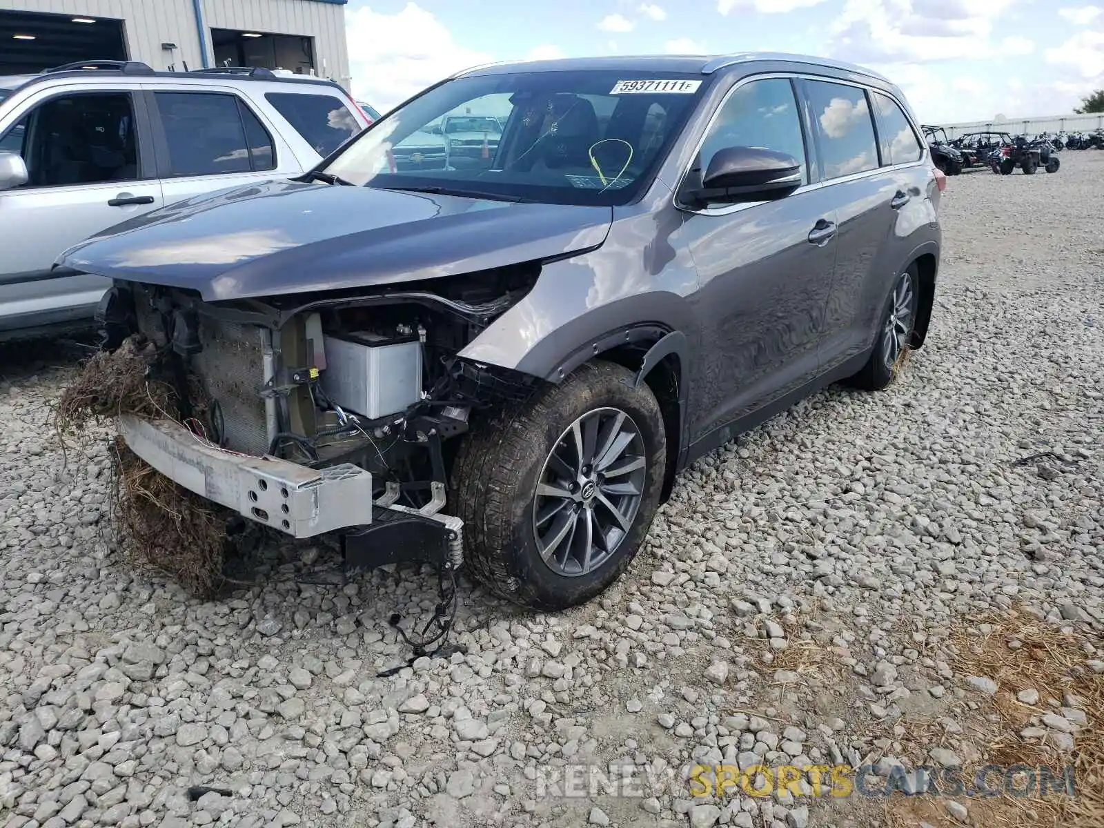 2 Photograph of a damaged car 5TDJZRFH3KS612057 TOYOTA ALL OTHER 2019