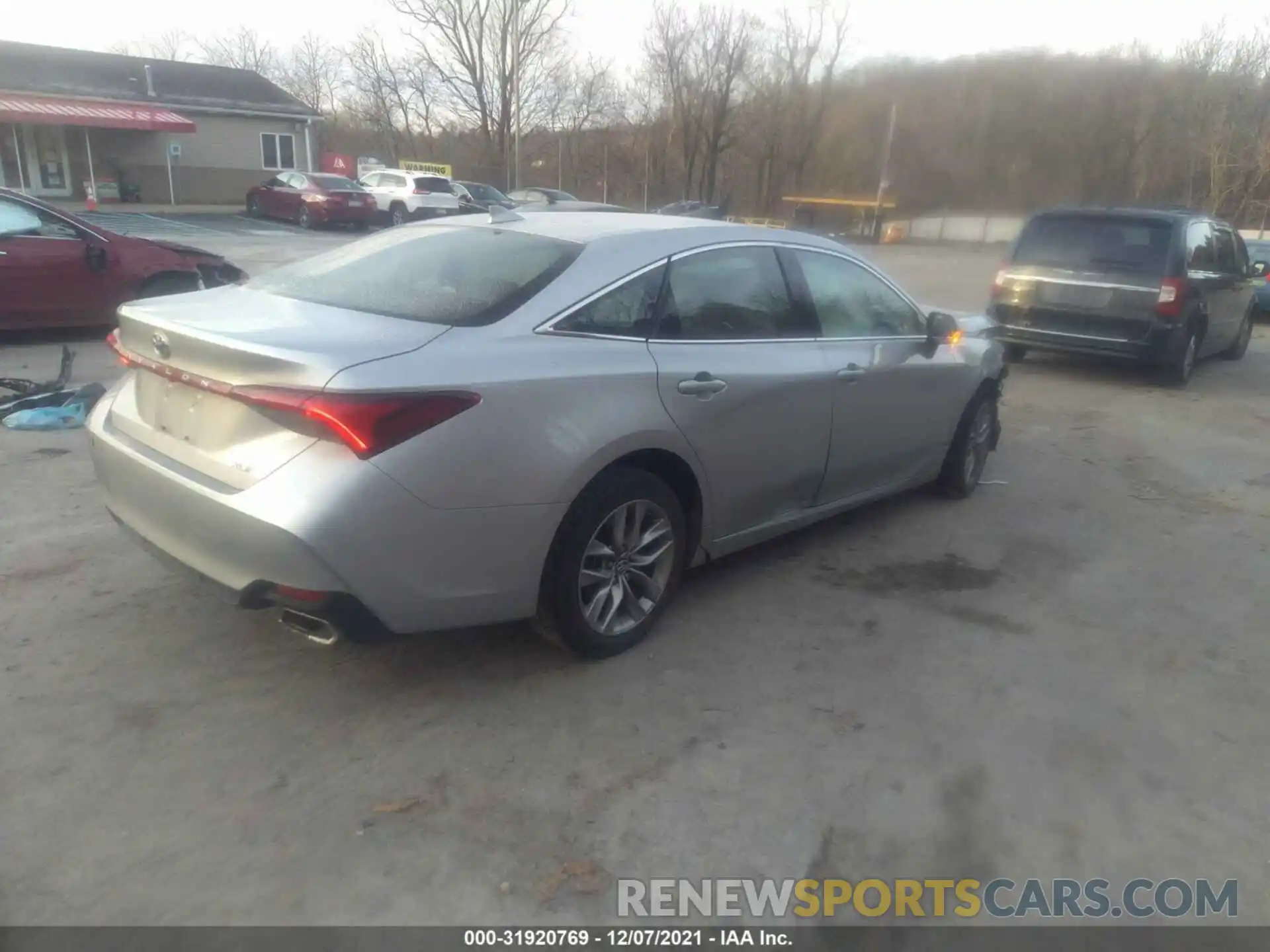 4 Photograph of a damaged car 4T1BZ1FB0KU002741 TOYOTA AVALON 2019