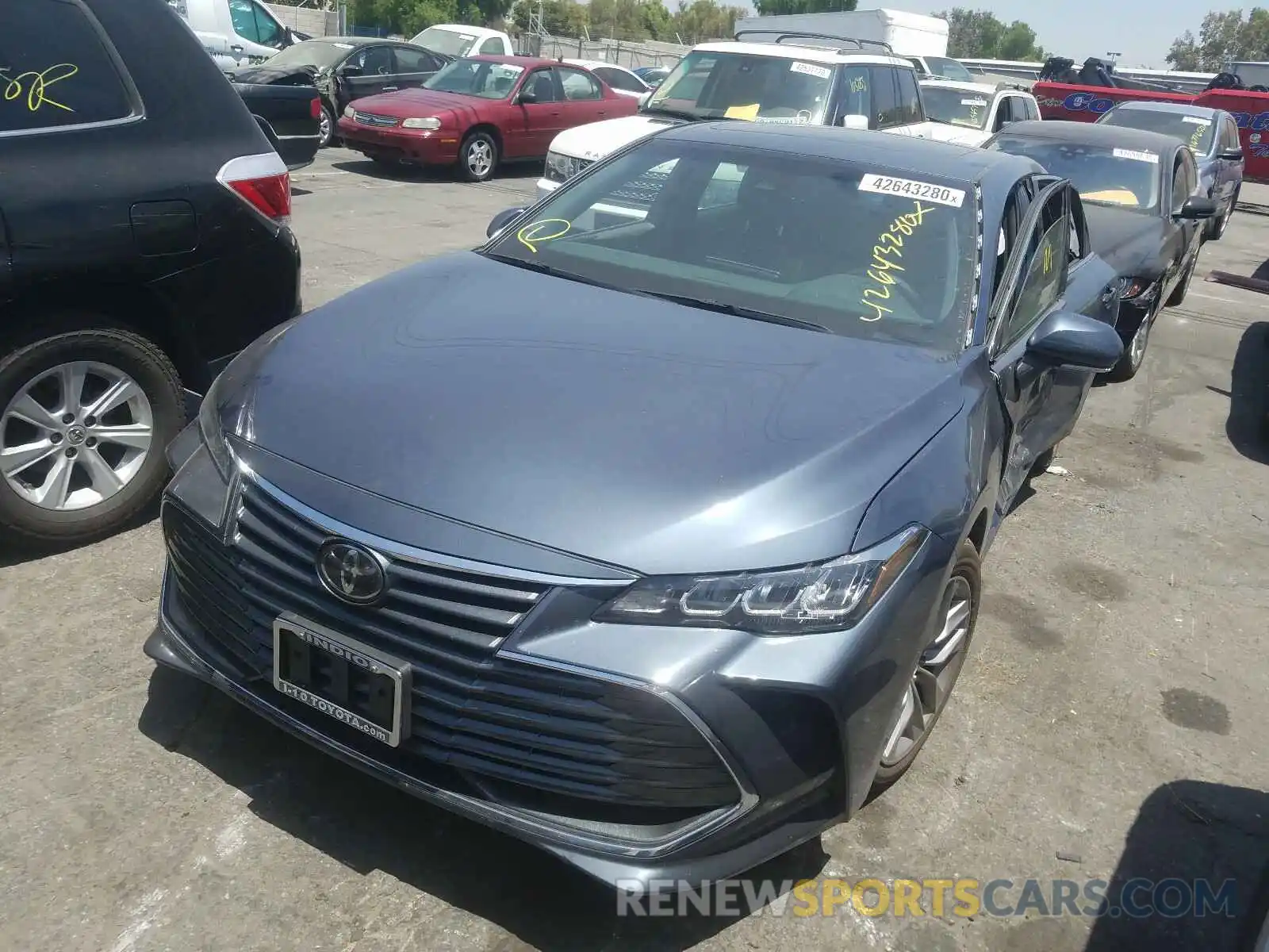 2 Photograph of a damaged car 4T1BZ1FB0KU009947 TOYOTA AVALON 2019