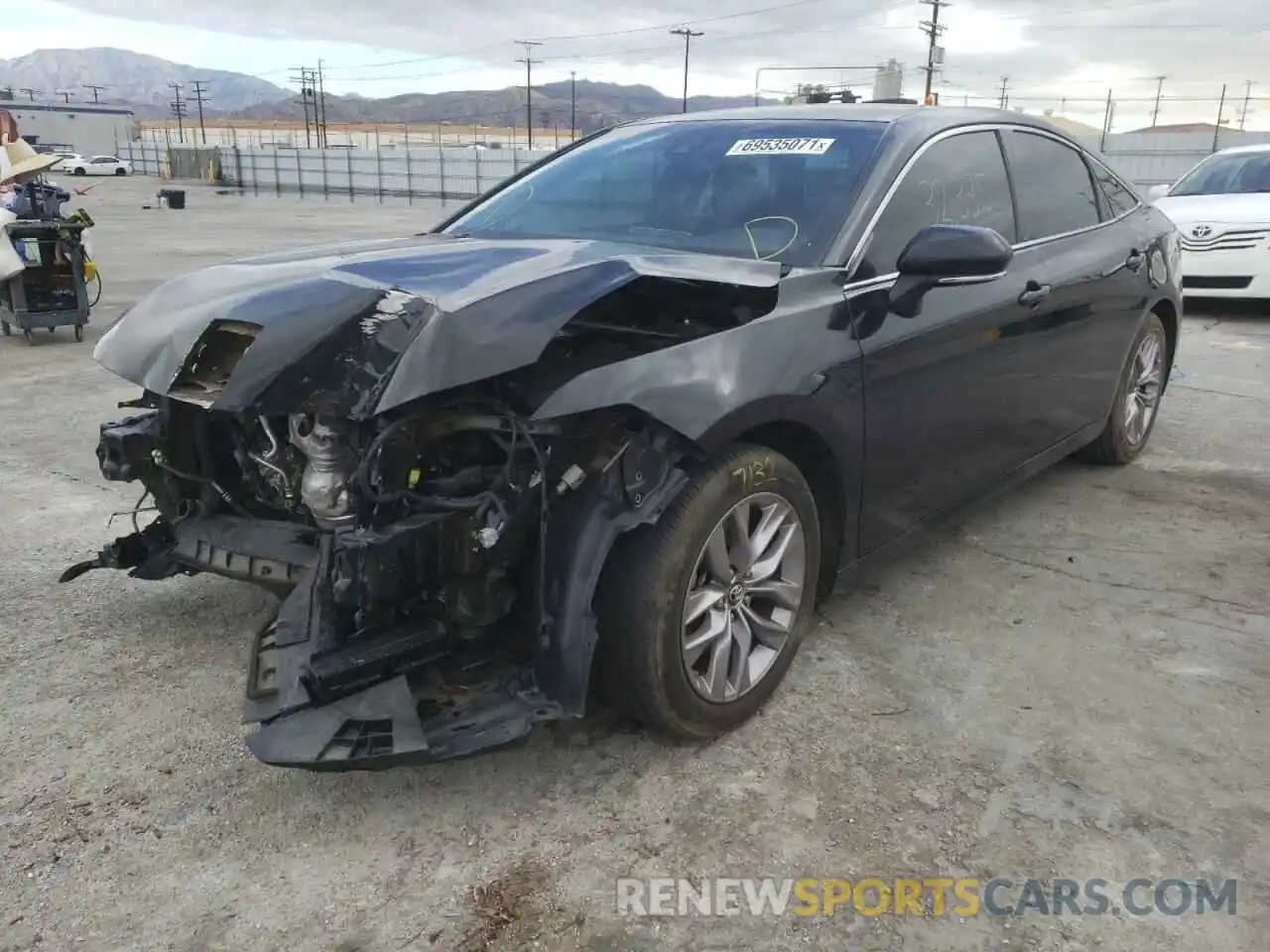 2 Photograph of a damaged car 4T1BZ1FB0KU019085 TOYOTA AVALON 2019