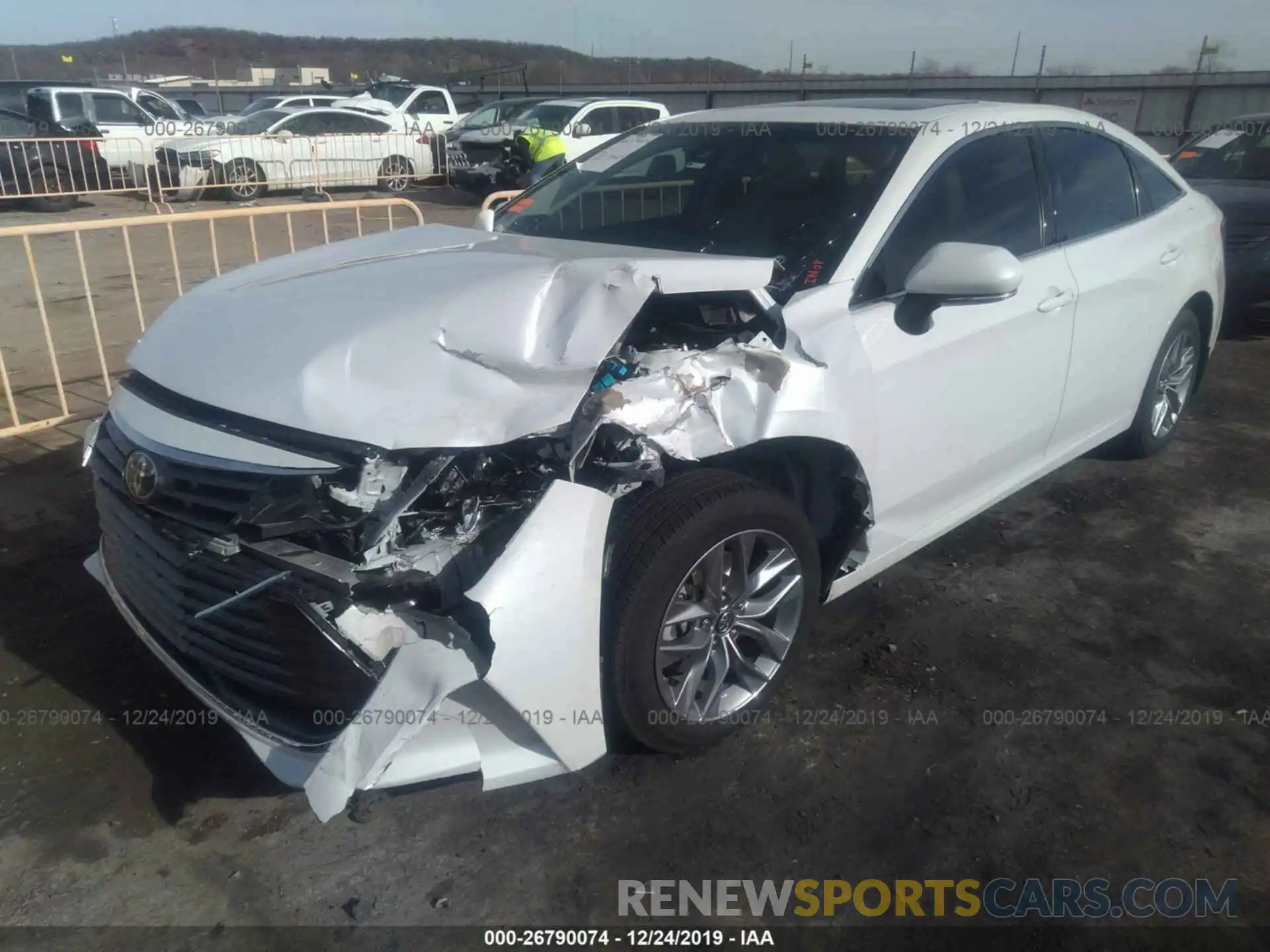 2 Photograph of a damaged car 4T1BZ1FB0KU023458 TOYOTA AVALON 2019