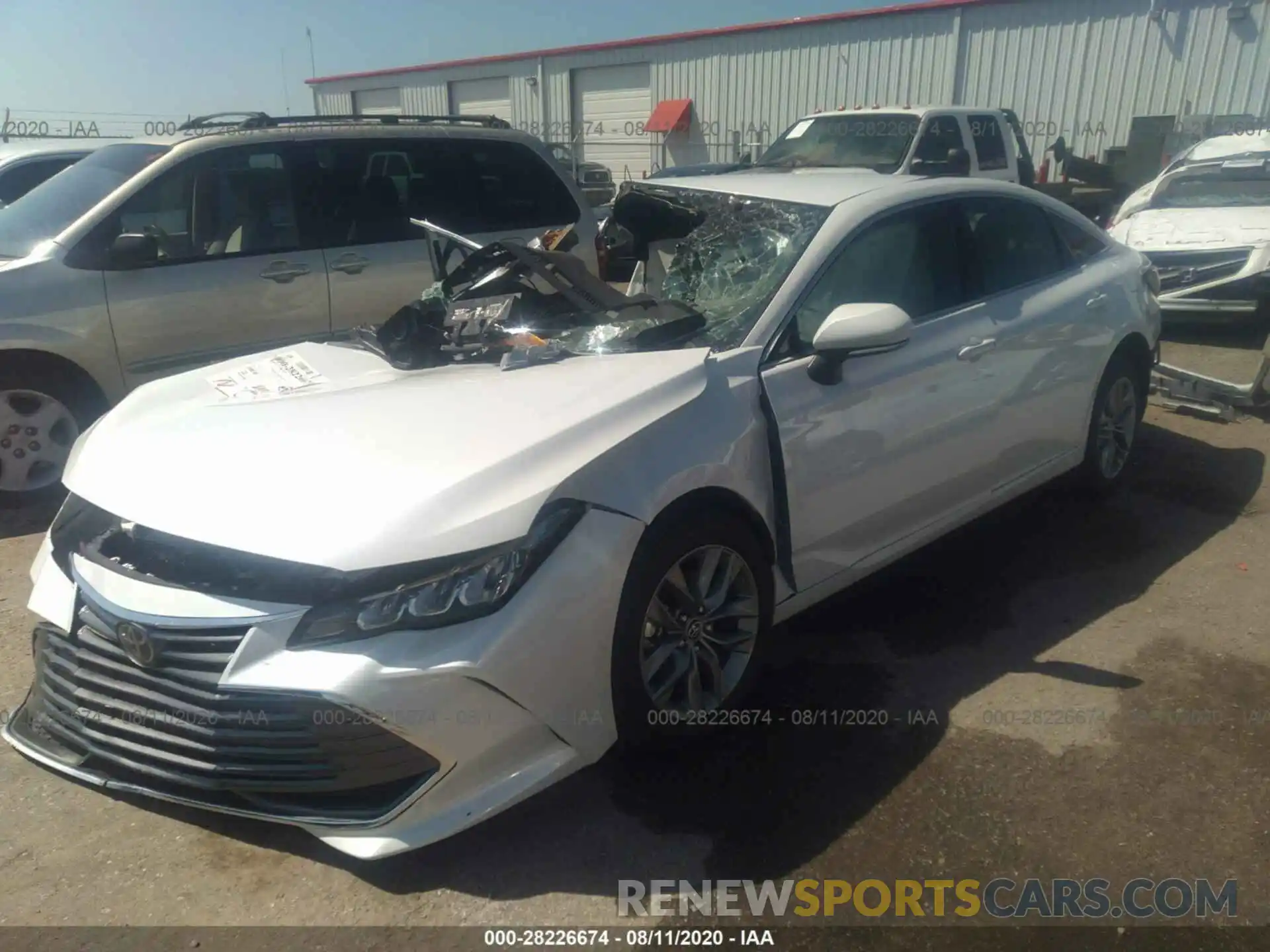 2 Photograph of a damaged car 4T1BZ1FB1KU033769 TOYOTA AVALON 2019