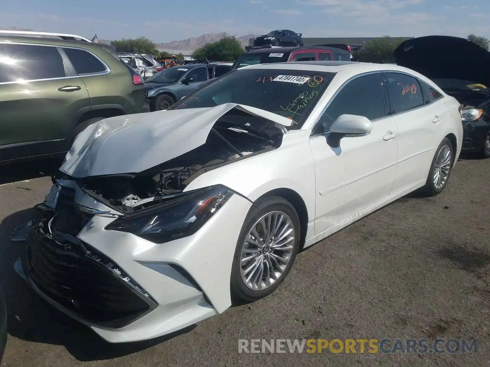 2 Photograph of a damaged car 4T1BZ1FB2KU013739 TOYOTA AVALON 2019