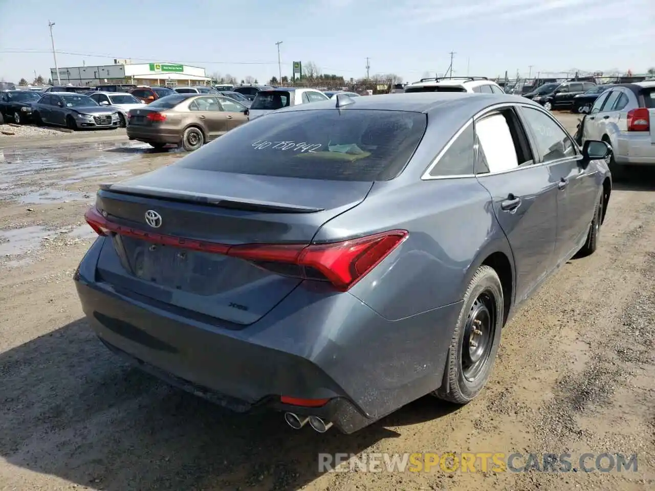 4 Photograph of a damaged car 4T1BZ1FB4KU013080 TOYOTA AVALON 2019