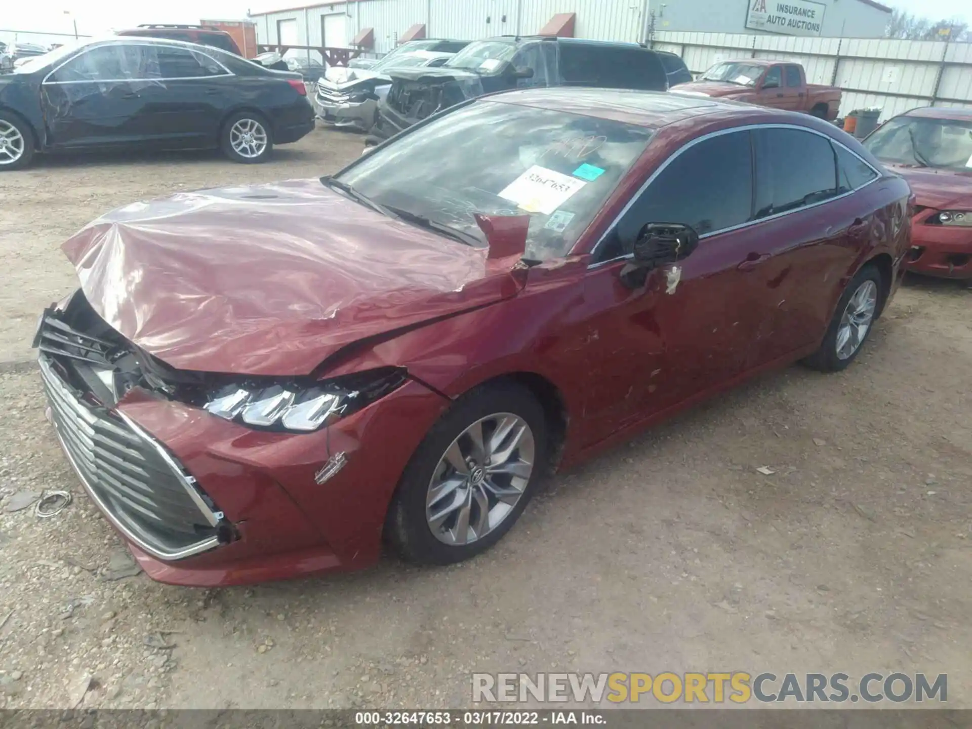 2 Photograph of a damaged car 4T1BZ1FB5KU003013 TOYOTA AVALON 2019