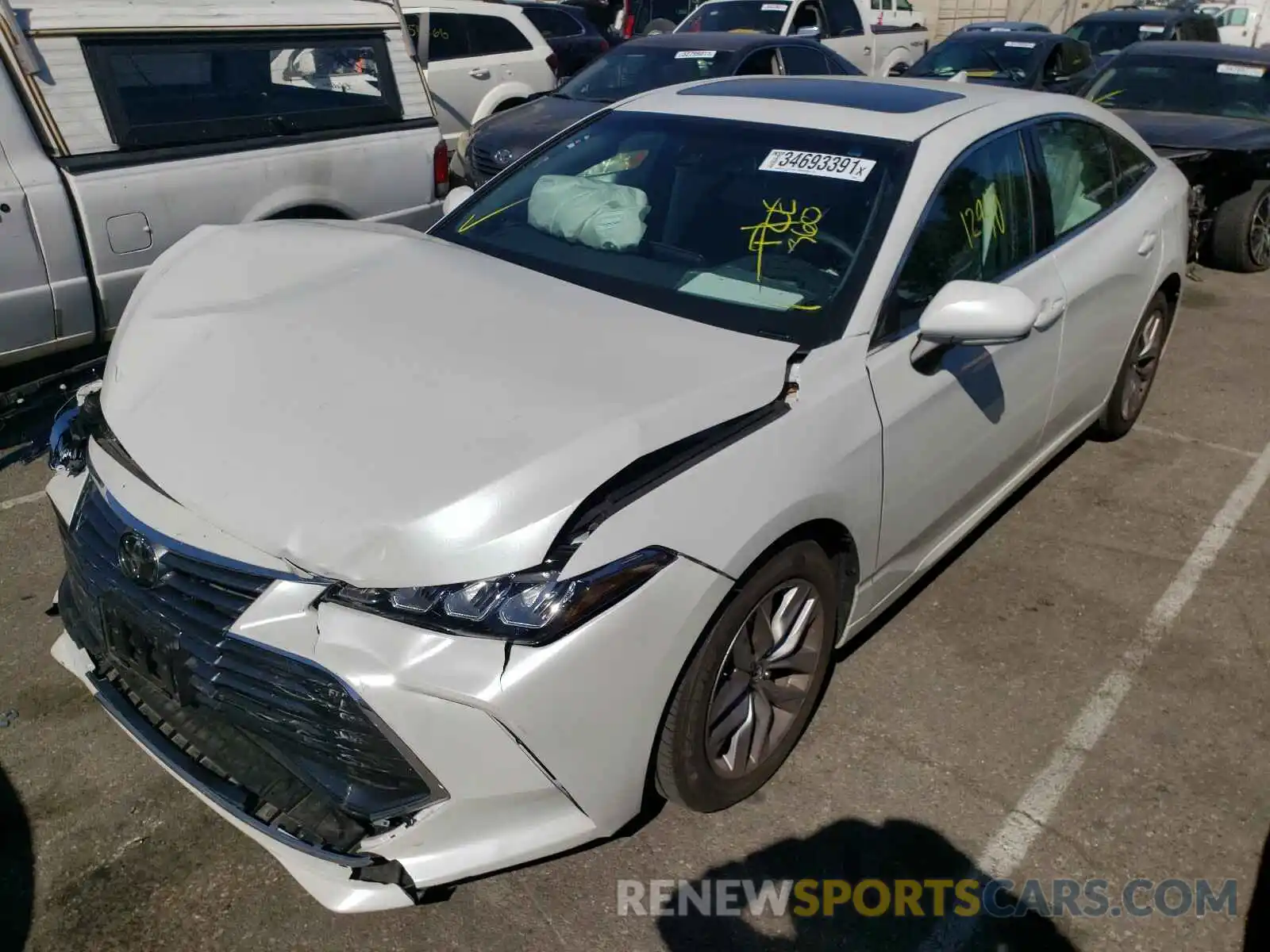 2 Photograph of a damaged car 4T1BZ1FB5KU008289 TOYOTA AVALON 2019