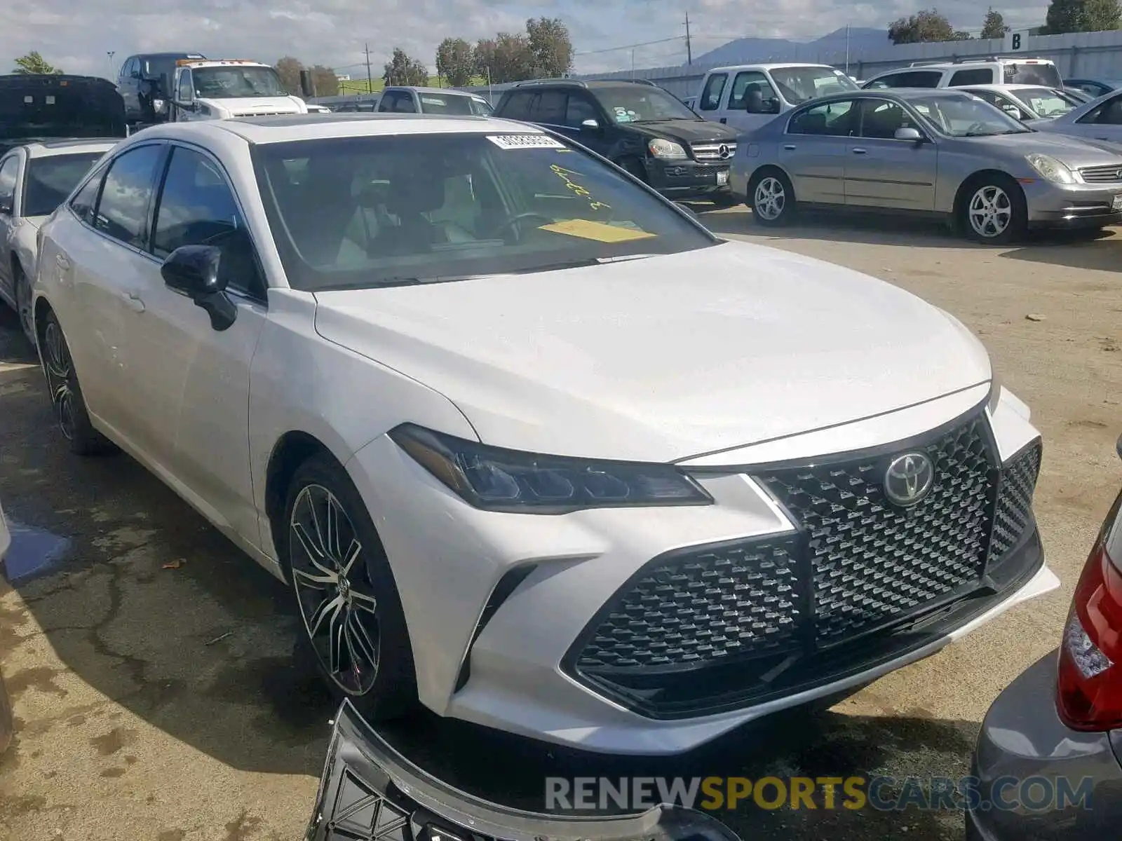 1 Photograph of a damaged car 4T1BZ1FB7KU002087 TOYOTA AVALON 2019