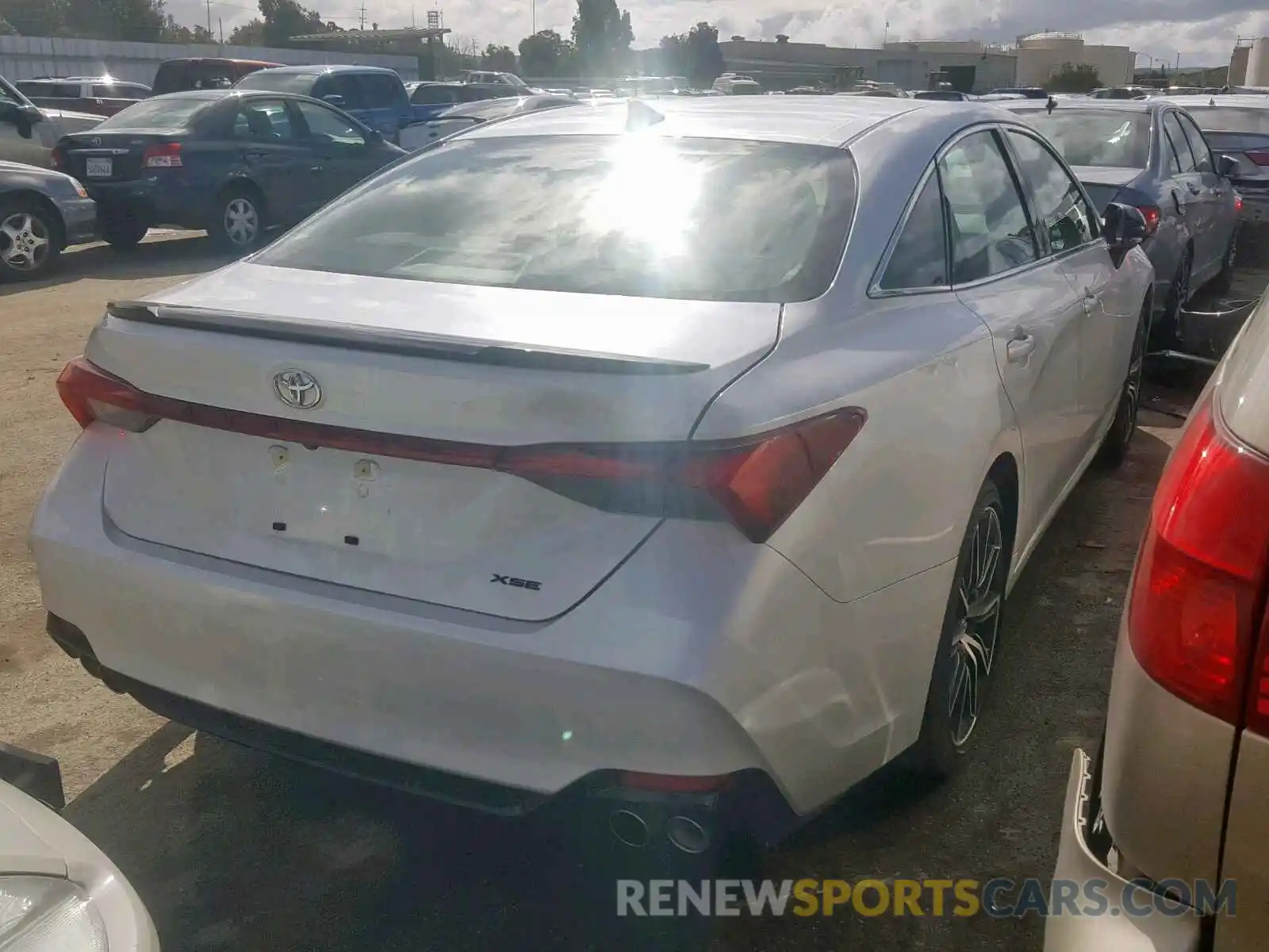 4 Photograph of a damaged car 4T1BZ1FB7KU002087 TOYOTA AVALON 2019