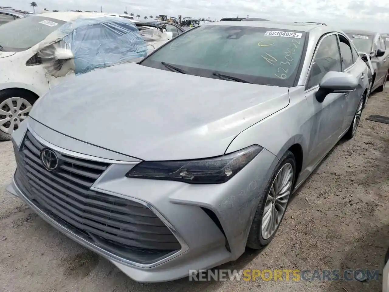 2 Photograph of a damaged car 4T1BZ1FB7KU011940 TOYOTA AVALON 2019